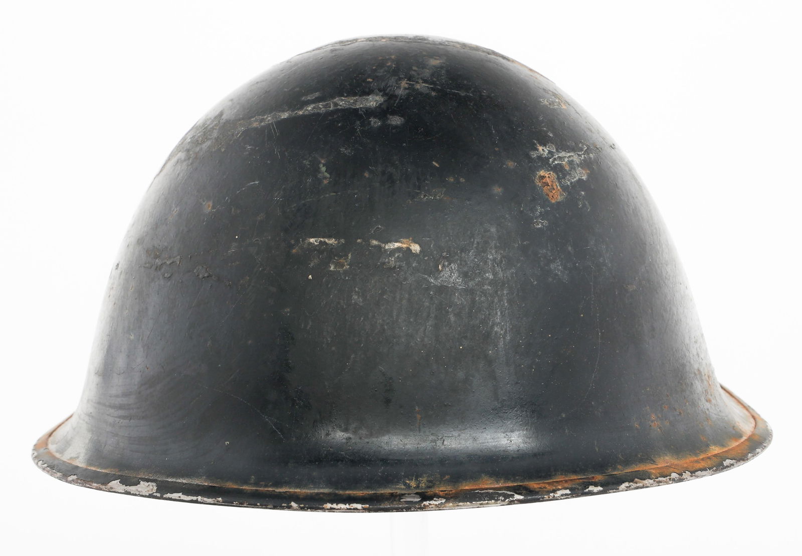 WWII BRITISH MkIV COMBAT HELMET: WWII BRITISH MkIV COMBAT HELMET WWII British MkIV Combat Helmet. Black painted shell with liner and chinstrap.