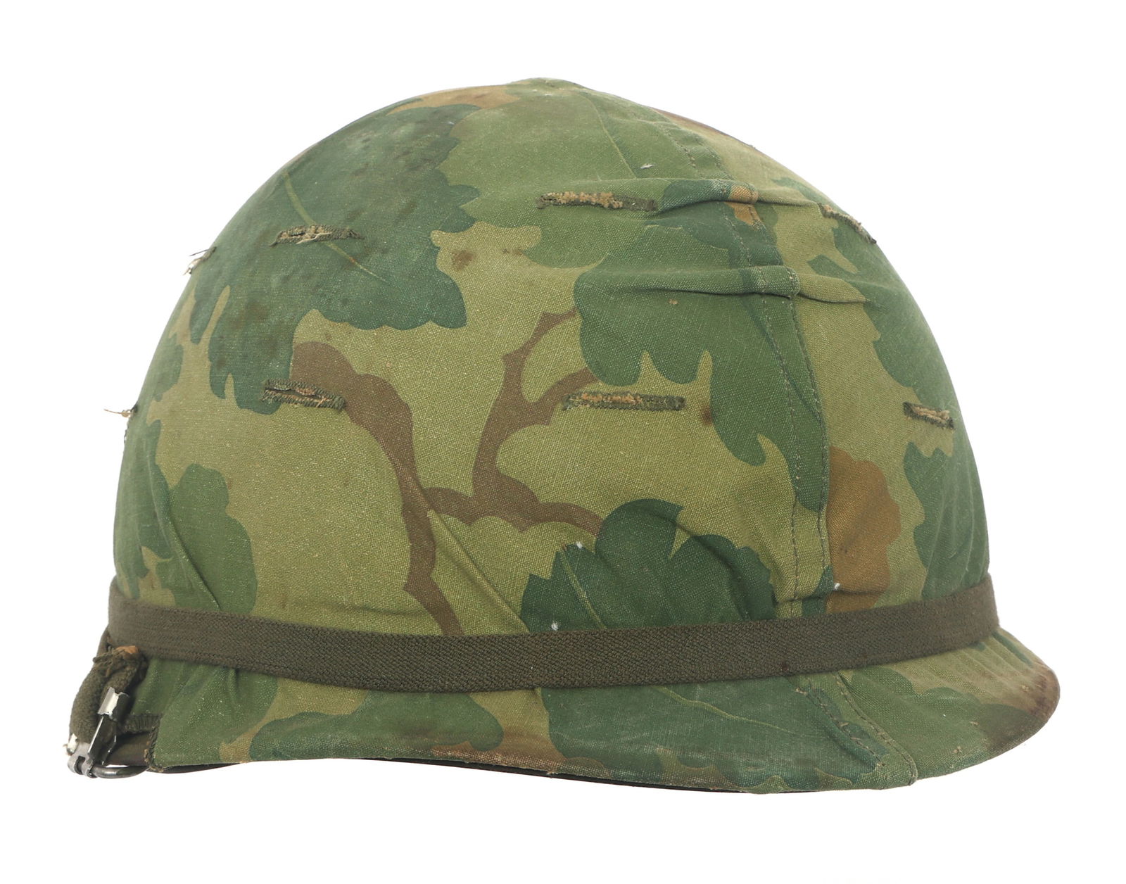 VIETNAM WAR US ARMY M1 COMBAT HELMET: VIETNAM WAR US ARMY M1 COMBAT HELMET Vietnam War US Army M1 combat helmet. Mitchell camo cover. Westinghouse liner has full suspension and leather sweat band, no chinstrap.