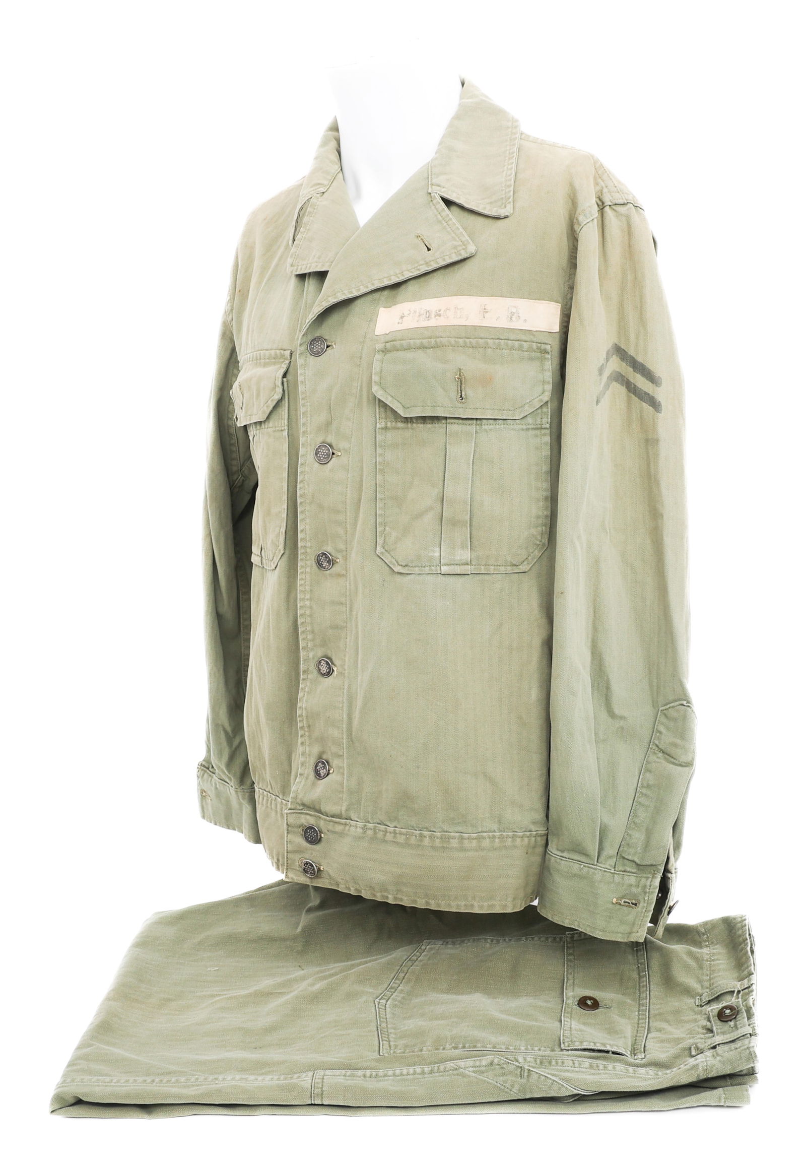 KOREAN WAR US ARMY HBT COMBAT SHIRT & TROUSERS: KOREAN WAR US ARMY HBT COMBAT SHIRT & TROUSERS Korean War US Army HBT Combat uniform set. (1) 1941 pattern HBT two pocket jacket with Corporal rank stamped on sleeves, name tag. Qmt tag present but fa