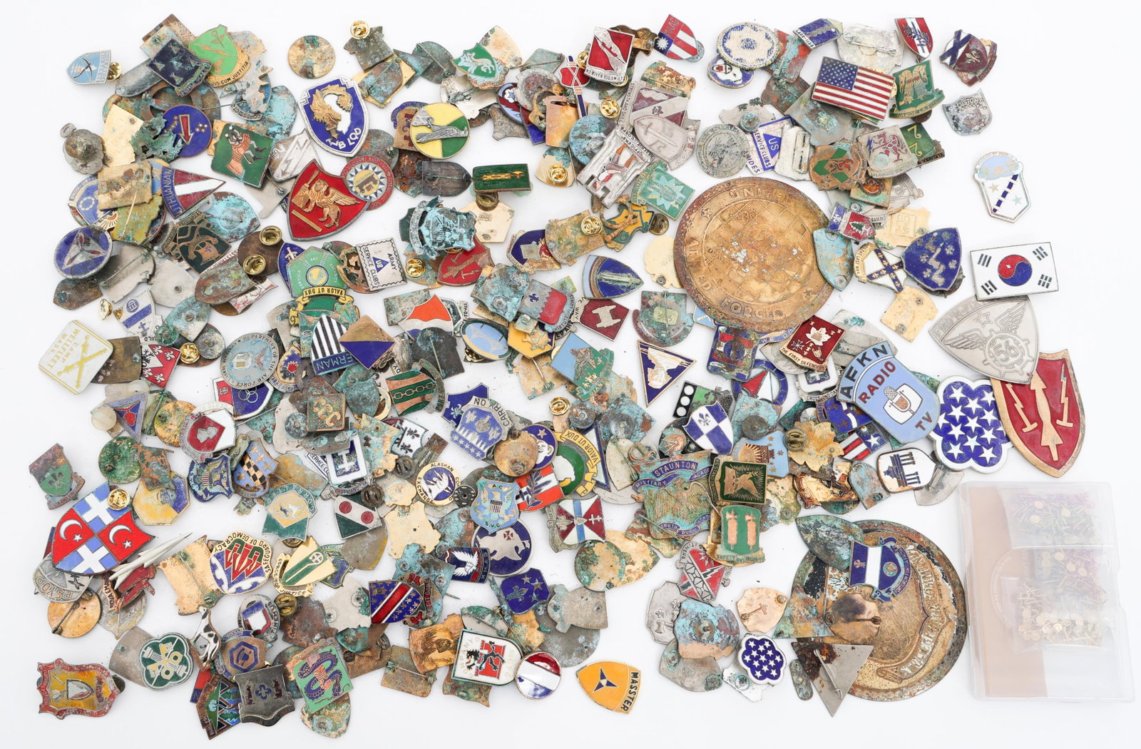 WORLD MILITARY DUI PINS & PARTS: WORLD MILITARY DUI PINS & PARTS World Military DUI Pins and Parts. Various countries and makers. Most pins are broken or missing. Includes additional pins and parts. Provenance - As told by the consig