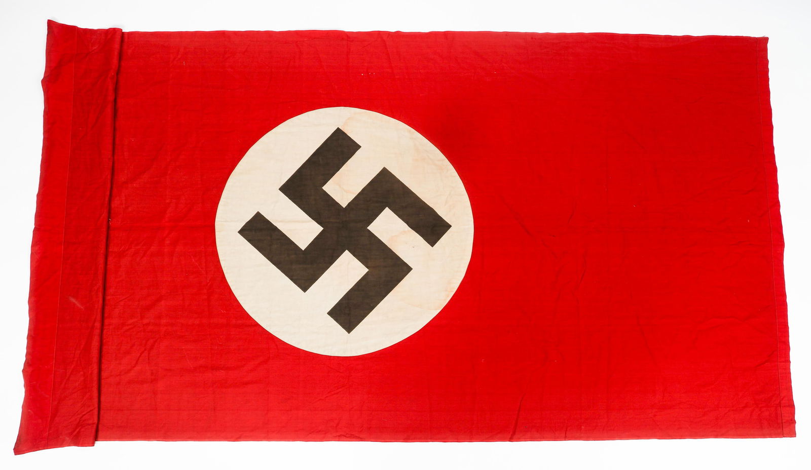 WWII GERMAN NSDAP BUILDING BANNER: WWII GERMAN NSDAP BUILDING BANNER WWII German NSDAP Building Banner. Double sided, two-piece cotton construction with printed emblem. No visible marks or stamps. Size: 50" x 107"