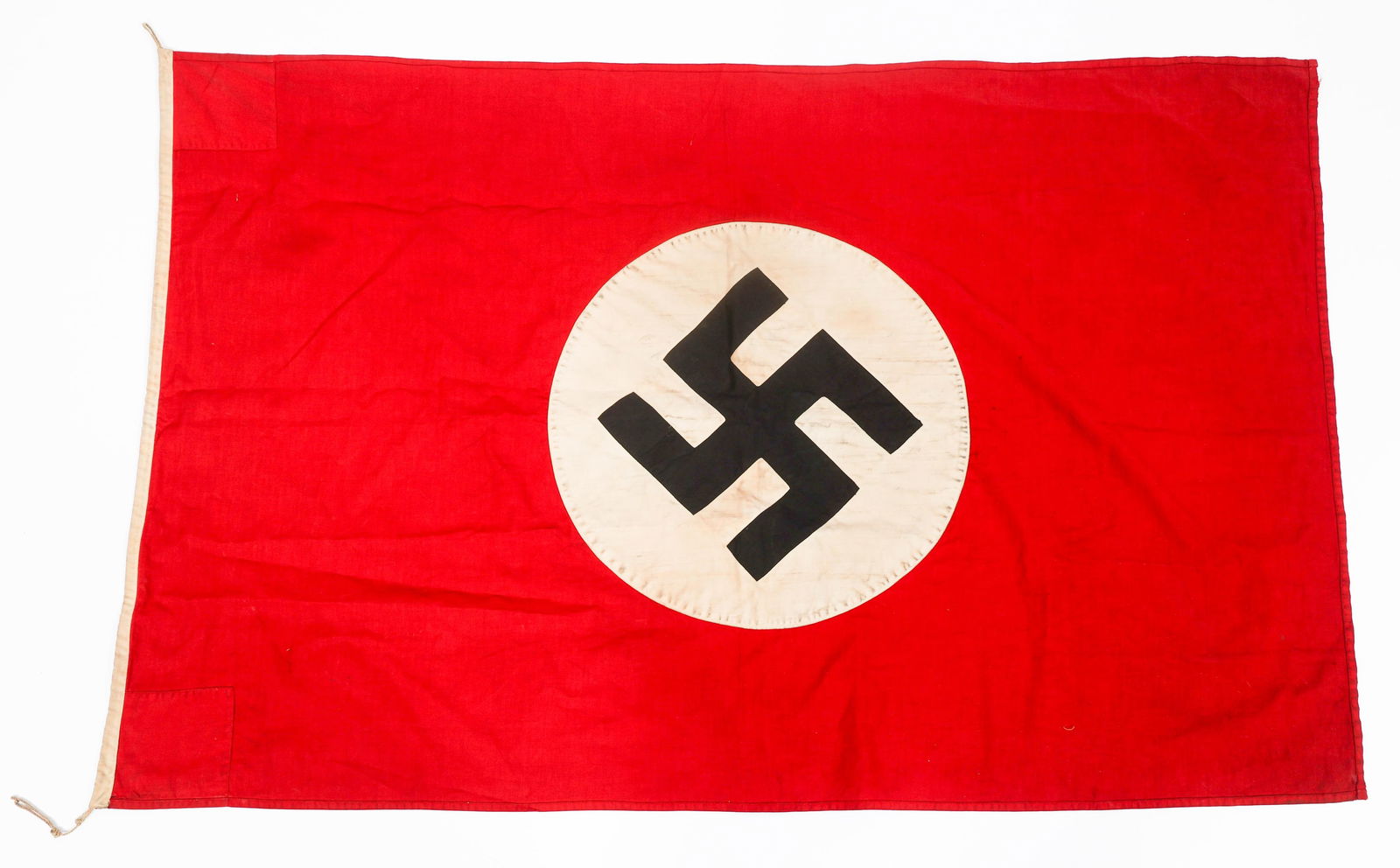 WWII GERMAN NSDAP FLAG: WWII GERMAN NSDAP FLAG WWII German NSDAP Flag. Double sided, two-piece cotton construction with printed emblem. No visible marks or stamps. Size: 50" x 32"