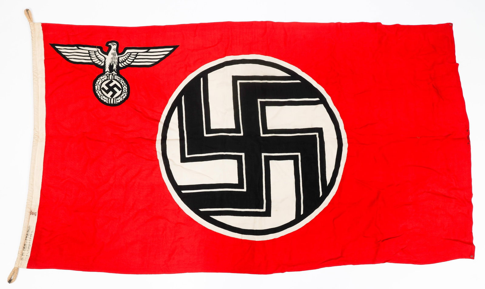 WWII GERMAN SERVICE STATE FLAG & ENSIGN: WWII GERMAN SERVICE STATE FLAG & ENSIGN WWII German State Service Flag & Ensign. Double sided, single-piece construction with printed eagle and swastika. Maker marked and size 100 x 170, reinforced he
