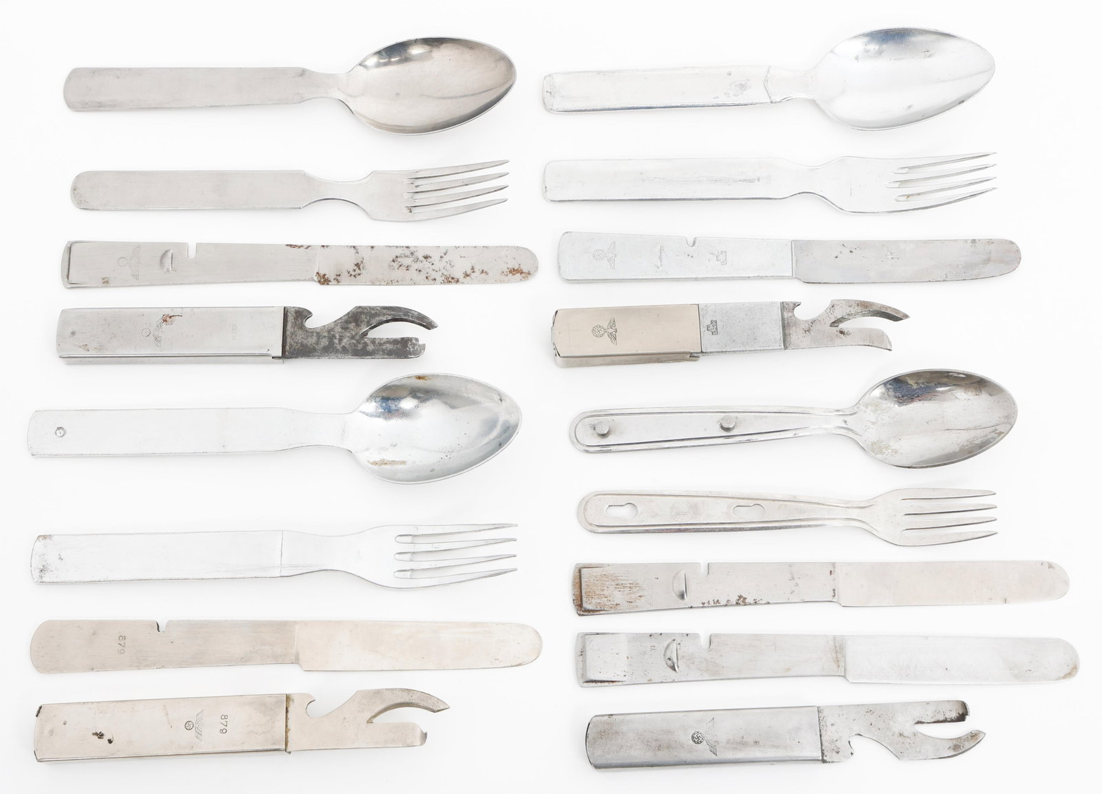 WWII GERMAN MESS KIT UTENSIL SETS: WWII GERMAN MESS KIT UTENSIL SETS WWII German Mess Kit Utensil Sets. One with serial number 879 and two marked by C & Cw and GAG. Dated 1942 and 1943. And more.