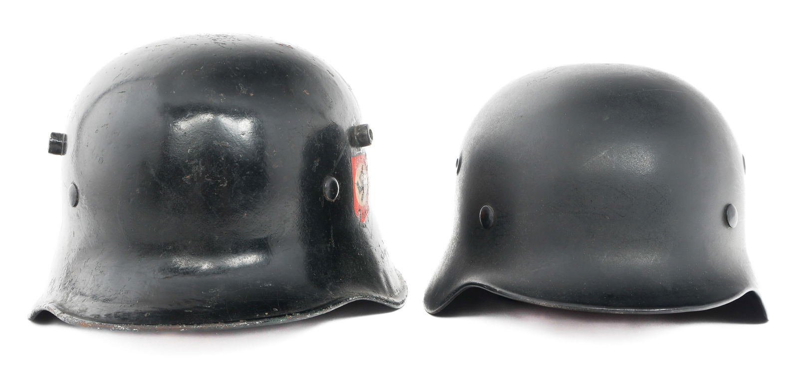 REFURBISHED WWII GERMAN M17 & M40 HELMETS: REFURBISHED WWII GERMAN M17 & M40 HELMETS Refurbished WWII German M17 and M40 Helmets. (1) M17. Period original M17 helmet shell. Repainted black shell with post-war applied SS and NSDAP decals. Repla