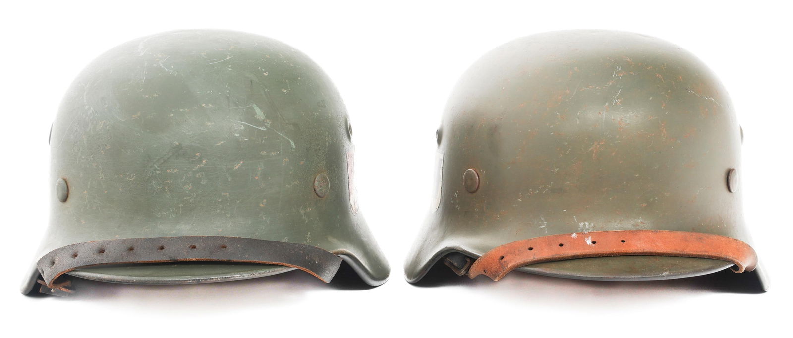REFURBISHED WWII GERMAN SS VOLUNTEER HELMETS: REFURBISHED WWII GERMAN SS VOLUNTEER HELMETS Refurbished WWII German SS Latvia and Wallonie Volunteer Helmets. (1) German SS Latvia Volunteer M40 Helmet. SS and Latvia Volunteer decals. Q64 stamped on