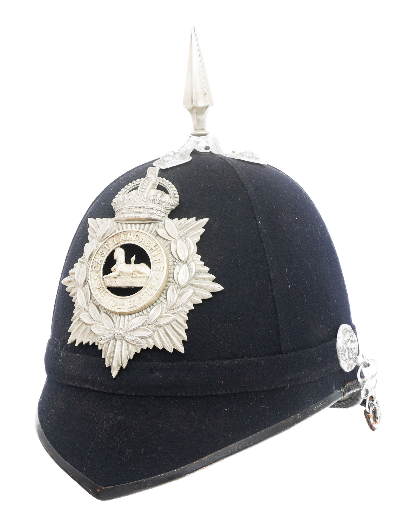 20TH C. BRITISH EAST LANCASHIRE VOLUNTEER HELMET: 20TH C. BRITISH EAST LANCASHIRE VOLUNTEER HELMET 20th C. British East Lancashire Home Service Helmet. Felt and cotton construction with 2nd Volunteer Battalion insignia. Alloy spike. Scaled brass and