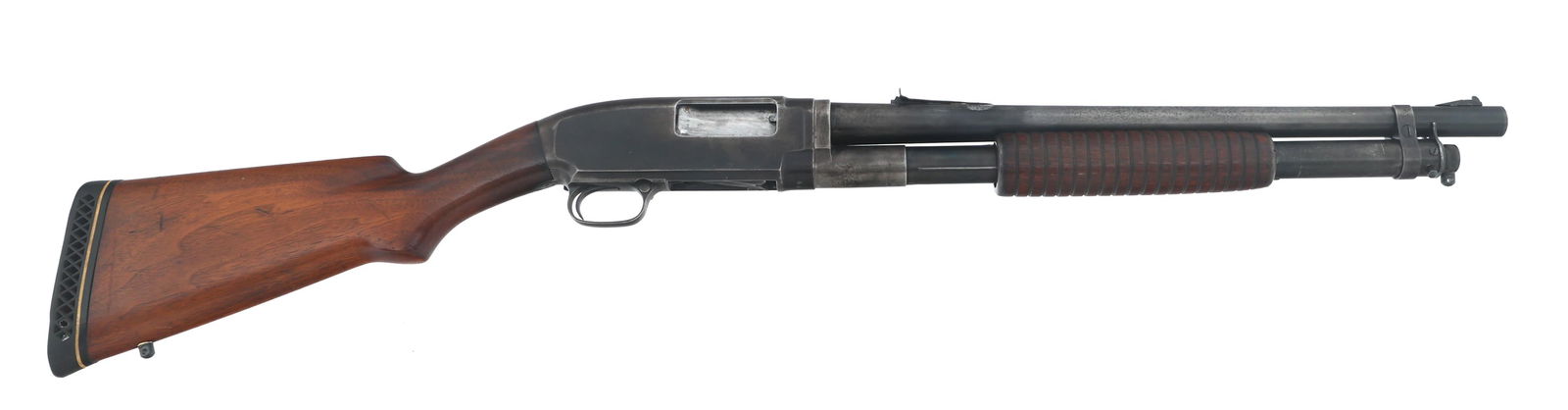WINCHESTER MODEL 12 12 GAUGE PUMP ACTION SHOTGUN: WINCHESTER MODEL 12 12 GAUGE PUMP ACTION SHOTGUN 1912 Winchester Model 12 12 gauge pump action shotgun. Cut barrel. 2.75" shells. Fixed Cylinder choke. Blued finish. Adjustable rear sight. Swivel stud