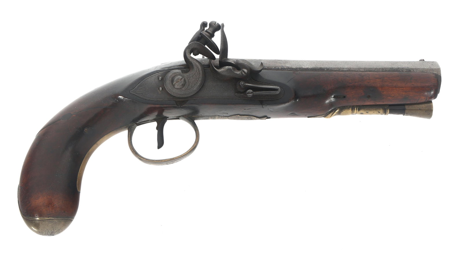 HUTCHINSON of DUBLIN 10 BORE FLINTLOCK PISTOL: HUTCHINSON of DUBLIN 10 BORE FLINTLOCK PISTOL Hutchinson of Dublin 10 bore flintlock pistol. Six inch octagonal barrel stamped DUBLIN on top. Lock plate stamped HUTCHINSON. Floral engraved tang. Brass