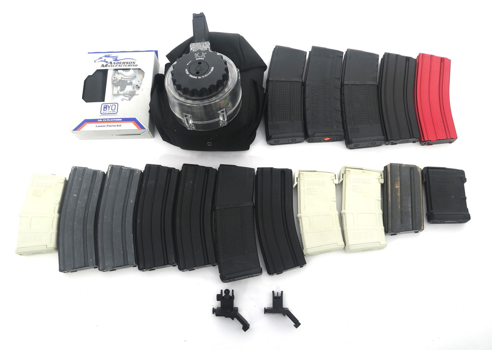 AR-15 5.56mm RIFLE MAGAZINES AND ACCESSORIES: AR-15 5.56mm RIFLE MAGAZINES AND ACCESSORIES AR-15 5.56X45mm rifle magazines and accessories. (1) 50 round drum. (16) stick magazines. Front and rear rail mount iron sights. Anderson Manufacturing AR-