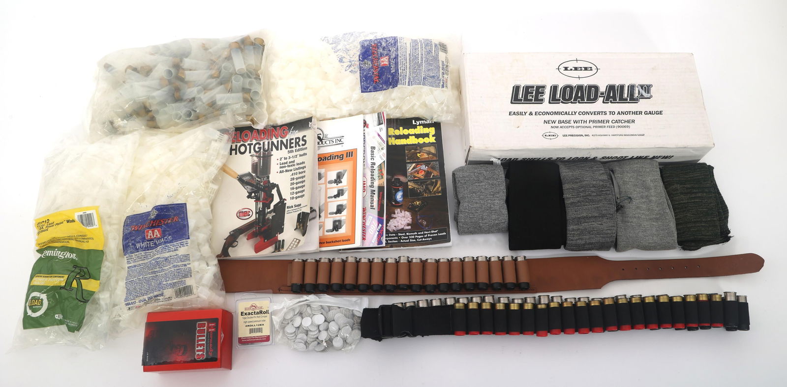 SHOTGUN SHELL RELOADING EQUIPMENT: SHOTGUN SHELL RELOADING EQUIPMENT Shotgun shell reloading equipment. Lee Load All II shotgun shell loader. Empty shells. #1 Buck shot. Shell belt and bandoleer with 12 gauge shells.