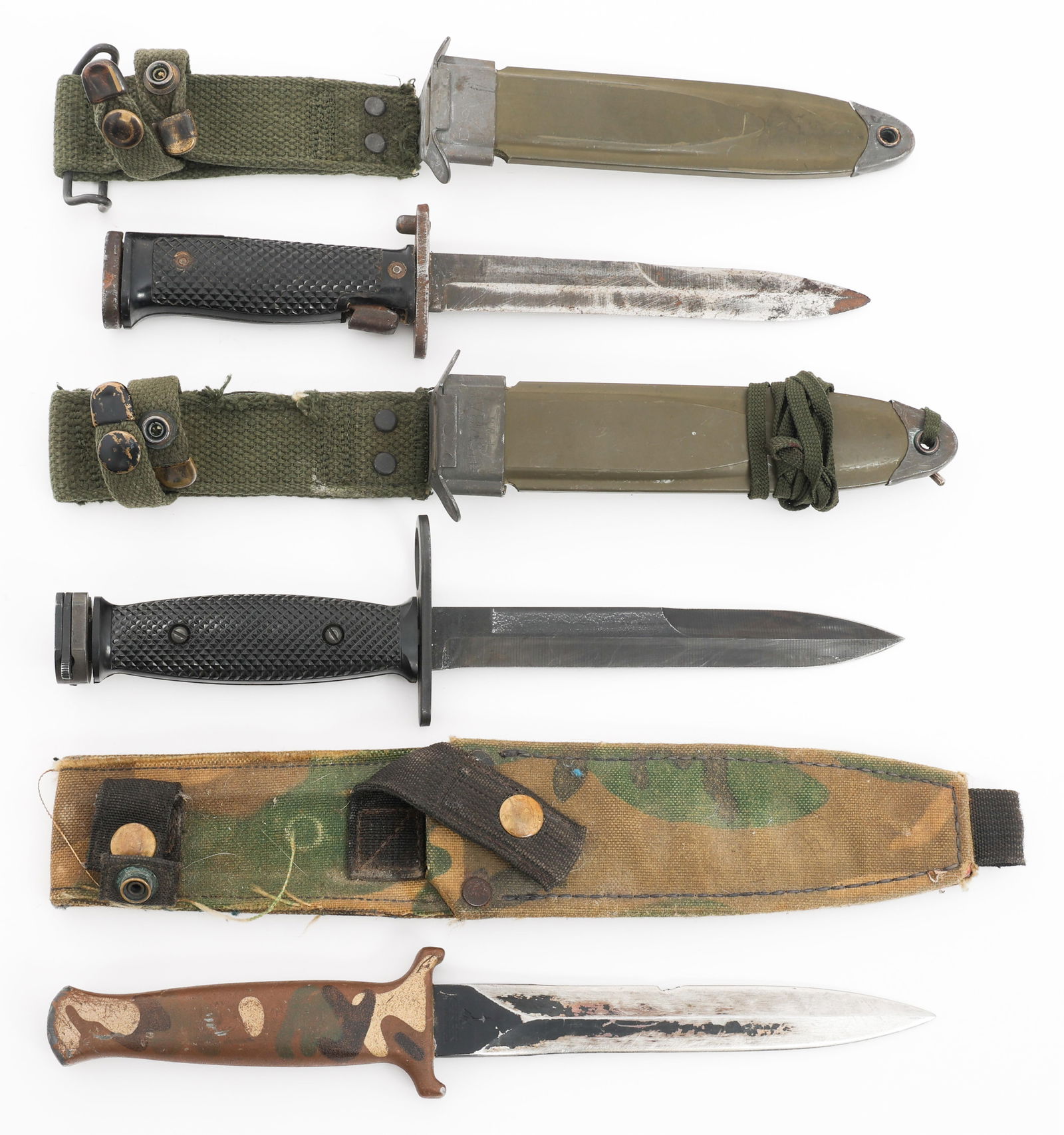 COLD WAR US M5, M7 BAYONETS & GERBER GUARDIAN: COLD WAR US M5, M7 BAYONETS & GERBER GUARDIAN Cold War US M5, M7 Bayonets and Gerber Guardian II. (1) M7 Bayonet. Single edged, parkerized blade. M8A1 scabbard with makers mark PWH. (1) M5 Bayonet. Si