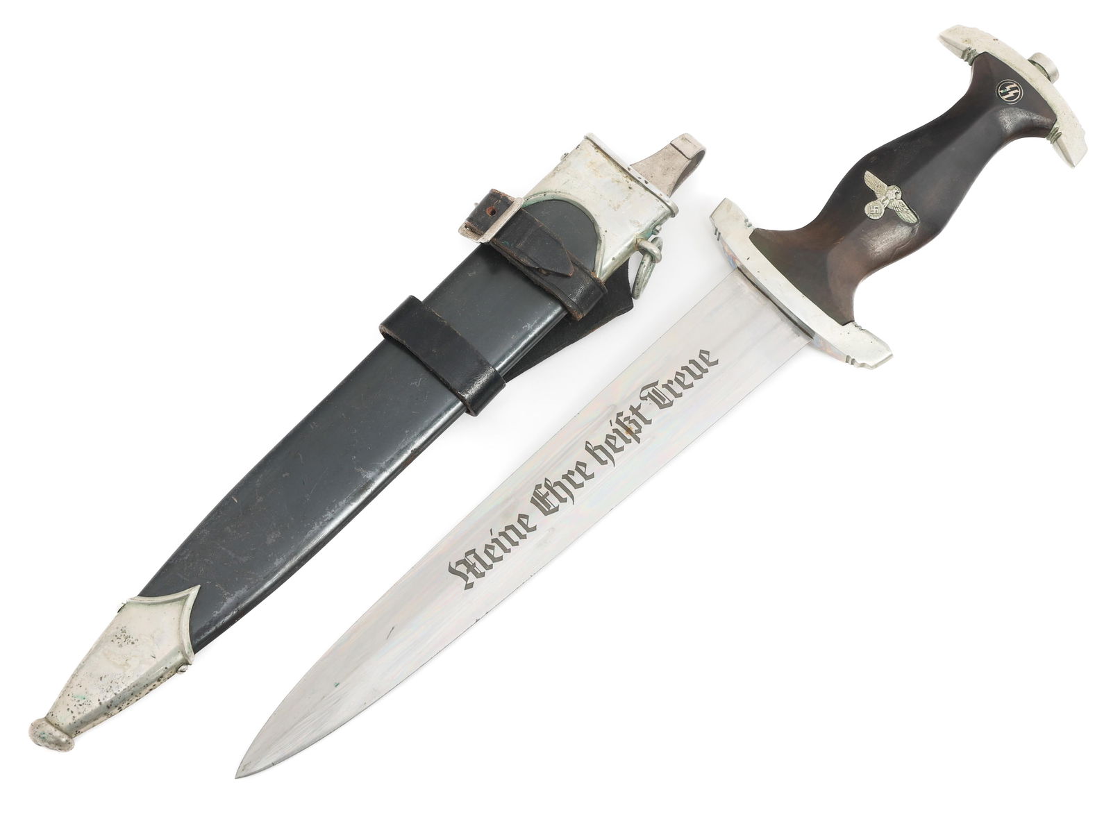 WWII GERMAN MODEL 1933 SS EM DAGGER RZM 120/34: WWII GERMAN MODEL 1933 SS EM DAGGER RZM 120/34 WWII German Model 1933 SS Enlisted Dagger. Double edged, bright blade. Acid etched motto Meine Ehre Hei?t Treue. Visible crossgrain. Maker marked RZM 120