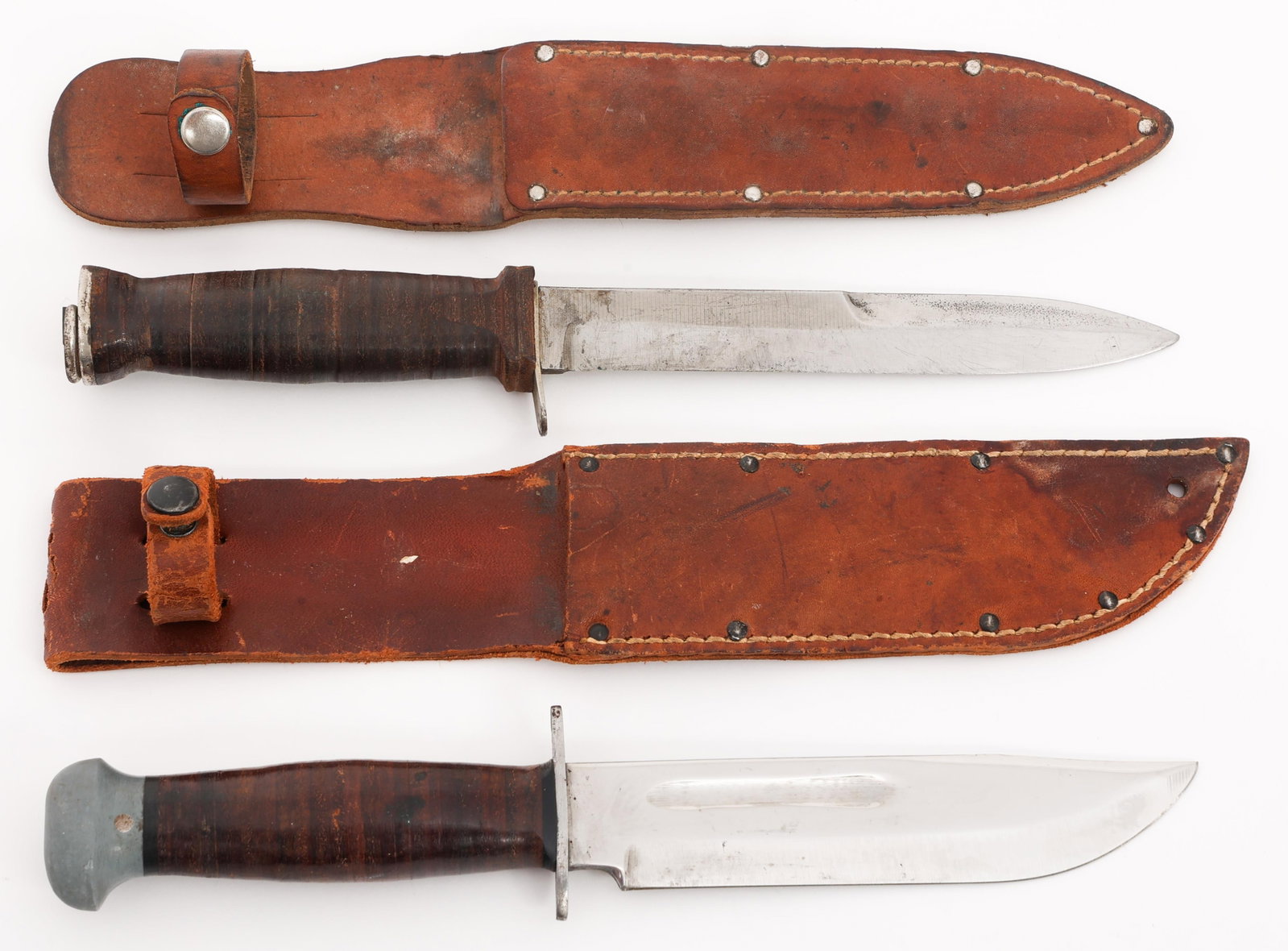 WWII US PAL RH-36 & KUTMASTER FIGHTING KNIVES: WWII US PAL RH-36 & KUTMASTER FIGHTING KNIVES WWII US Pal RH-36 and Kutmaster M3 Fighting Knives. (1) Pal RH-36. Single edged, bright blade with fuller. Maker marked by Pal RH-36 on the ricasso. Steel