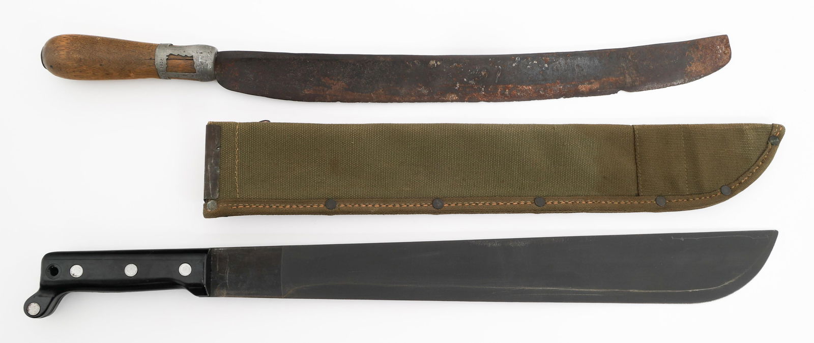 WWII US SWI SURPLUS & THEATER MADE MACHETES: WWII US SWI SURPLUS & THEATER MADE MACHETES WWII US SWI 1943 Surplus & Theater Made Machetes. (1) SWI 1943 Surplus Machete. Single edged, parkerized blade. US SWI 1943 stamped on one side. Black plast