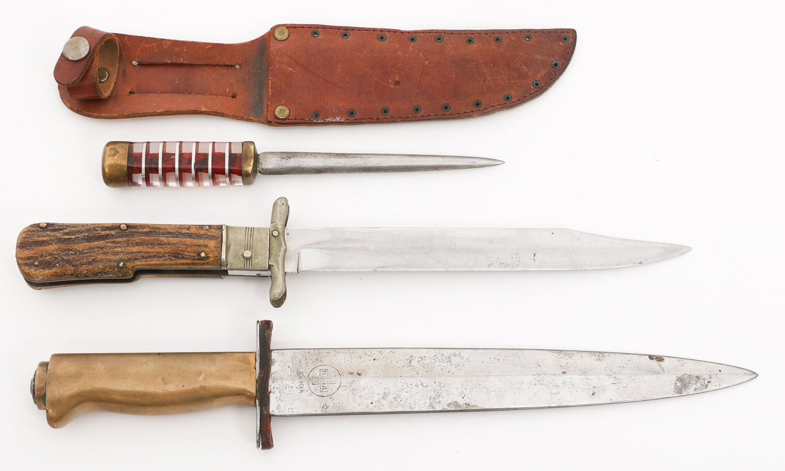 WWII THEATER MADE COMBAT KNIVES & SWITCHBLADE: WWII THEATER MADE COMBAT KNIVES & SWITCHBLADE WWII Theater Made Combat Knives and Switchblade. (1) Theater made modified SA Dagger Knife. Re-Polished SA Dagger Blade. Engraved Alles fur Deutschland. M
