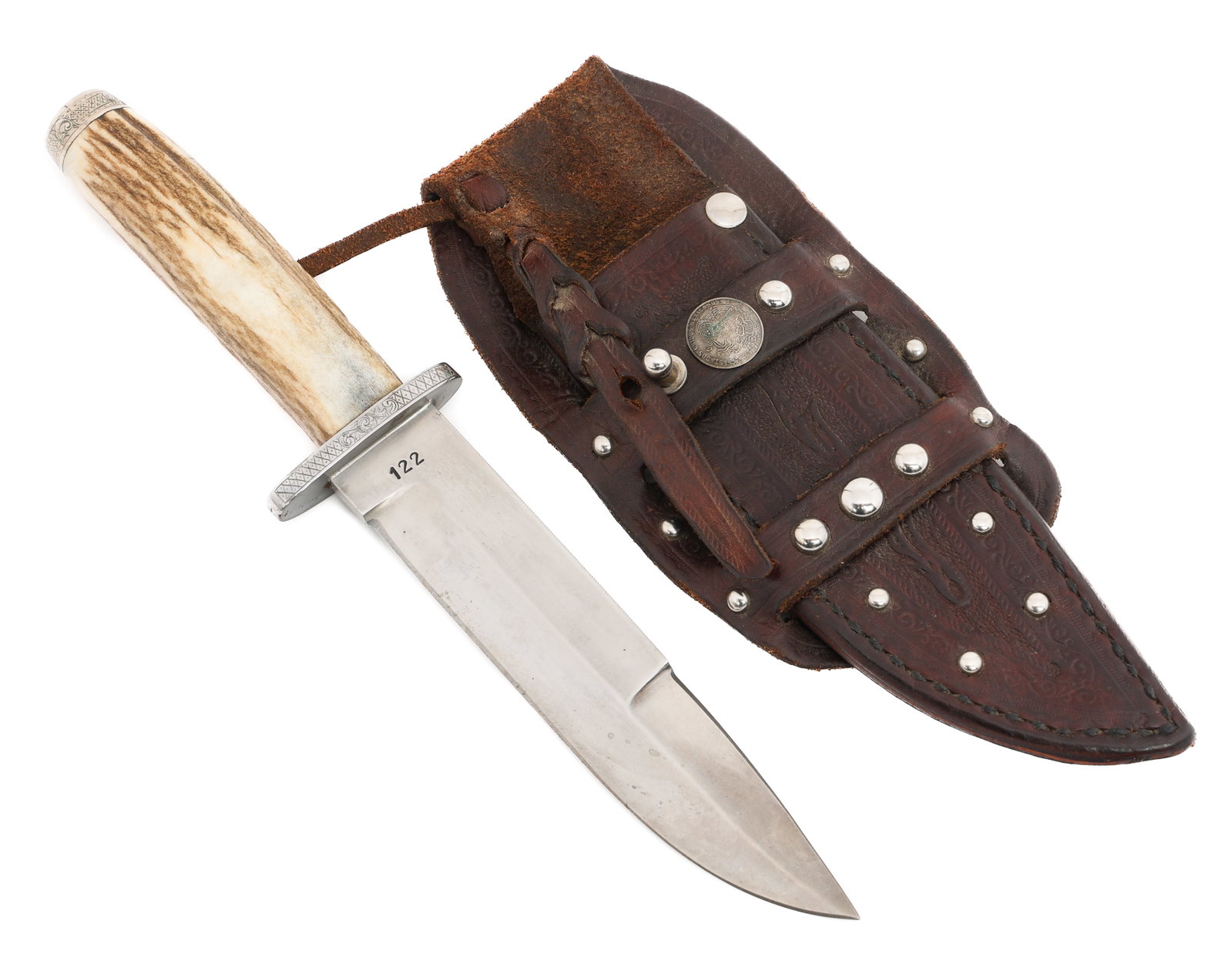CUSTOM MADE KNIFE by WAYNE SKAGGS WITH SHEATH: CUSTOM MADE KNIFE by WAYNE SKAGGS WITH SHEATH Custom Made Knife. Single edged, bright blade. Maker marked by Skaggs on the ricasso, serial numbered 122 on the reverse. Steel crossguard with horn handl