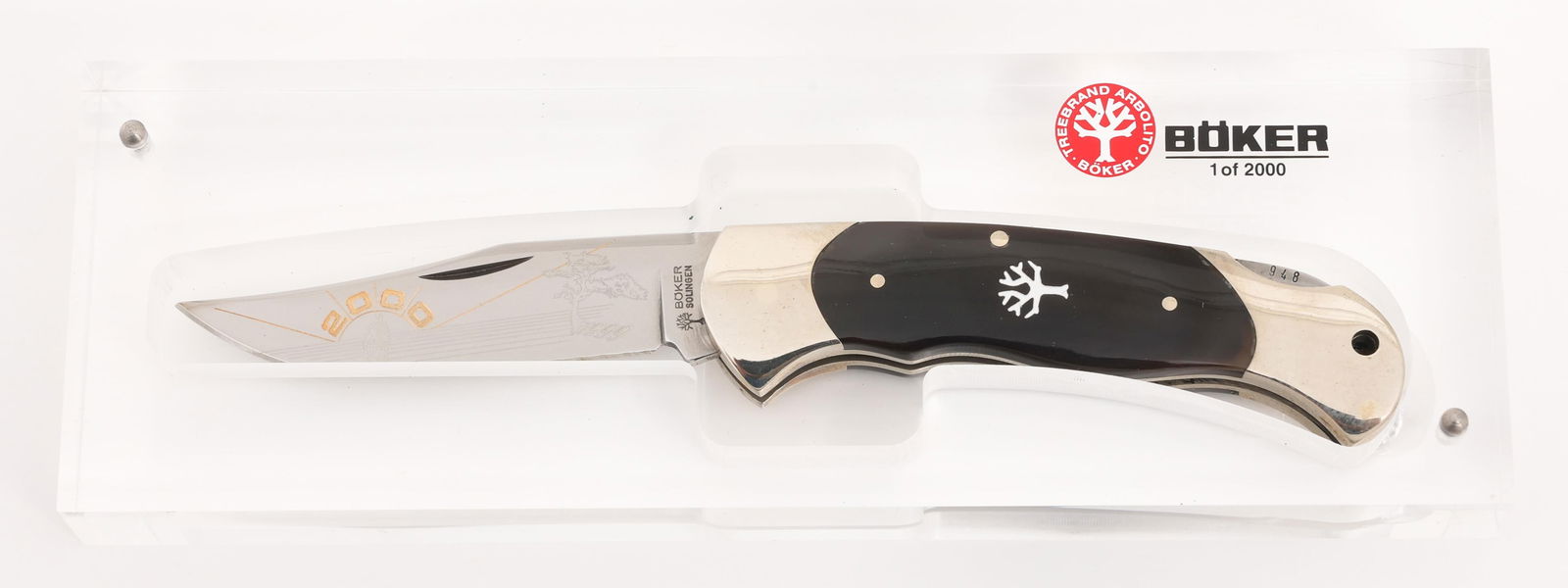 BOKER 24K GOLD ETCHED BLADE NEW DAWN SCOUT KNIFE: BOKER 24K GOLD ETCHED BLADE NEW DAWN SCOUT KNIFE Boker New Dawn Scout Lockback Folding Knife. Single edged, bright blade with "2000" etched in 24k gold on the blade. Edition 948 of 2000. Nickel-silver