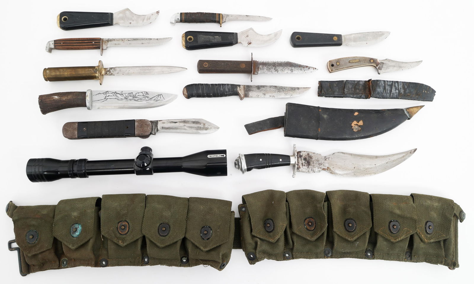 20TH C. FIXED BLADE KNIVES, SCOPE, & BELT: 20TH C. FIXED BLADE KNIVES, SCOPE, & BELT 20th Century Knives, Rifle Scope, and Cartridge belt. (12) Fixed Blade Knives. Makers include Schrade, Western, Imperial, Colonial and more. (1) USMC Cartridg