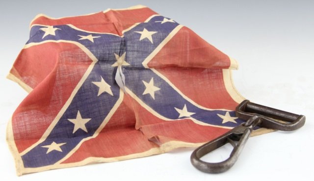 CARBINE SADDLE SLING CLIP AND CSA FLAG: CARBINE SADDLE SLING CLIP AND CSA FLAG Civil War Memorabilia lot to include: swivel saddle sling clip for a carbine rifle, light rust and pitting, and a Confederate Flag for reenactment purposes dated