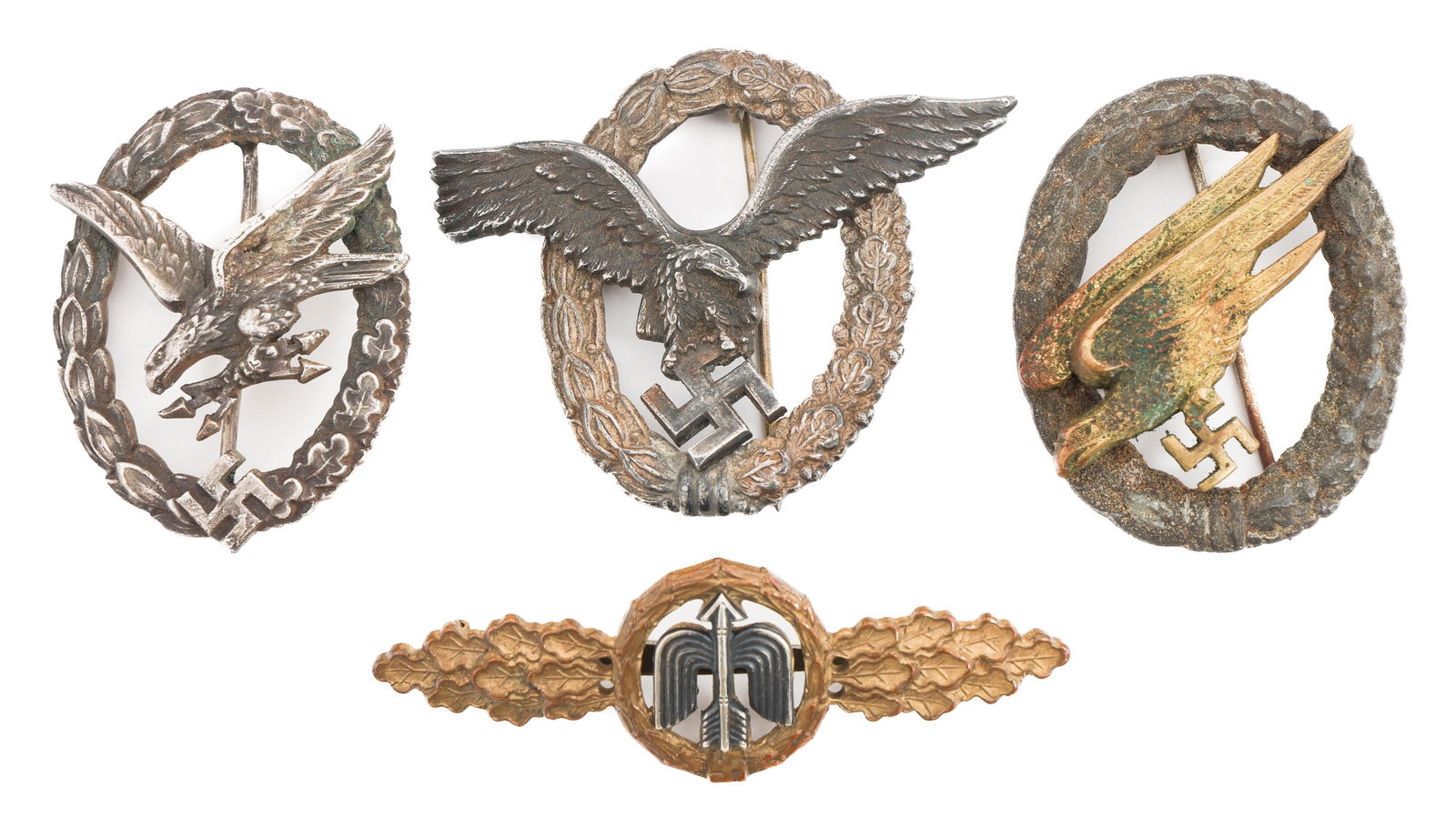 WWII GERMAN LUFTWAFFE CLOSE COMBAT CLASP & BADGES: WWII GERMAN LUFTWAFFE CLOSE COMBAT CLASP & BADGES WWII German Luftwaffe Close Combat Clasp and Assault Badges. (1) Day Fighter Operational Flying Clasp. Bronze grade. (1) Fallschirmjager Badge. No vis