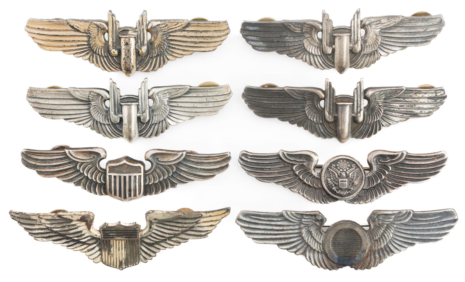 WWII US ARMY AIR FORCE 3" QUALIFICATION WINGS: WWII US ARMY AIR FORCE 3" QUALIFICATION WINGS WWII USAAF Qualification Wings. Clutchback and pinback construction. (4) Aerial Gunner. Three marked Sterling. (2) Pilot. One marked by LGB and Sterling.