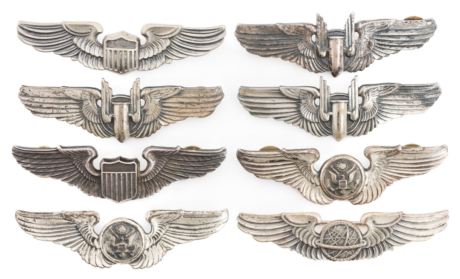WWII US ARMY AIR FORCE AAF 3" QUALIFICATION WINGS: WWII US ARMY AIR FORCE AAF 3" QUALIFICATION WINGS WWII USAAF Qualification Wings. Clutchback and pinback construction. (3) Aerial Gunner. All marked Sterling. (2) Pilot. One marked by NS Meyer and 9M.