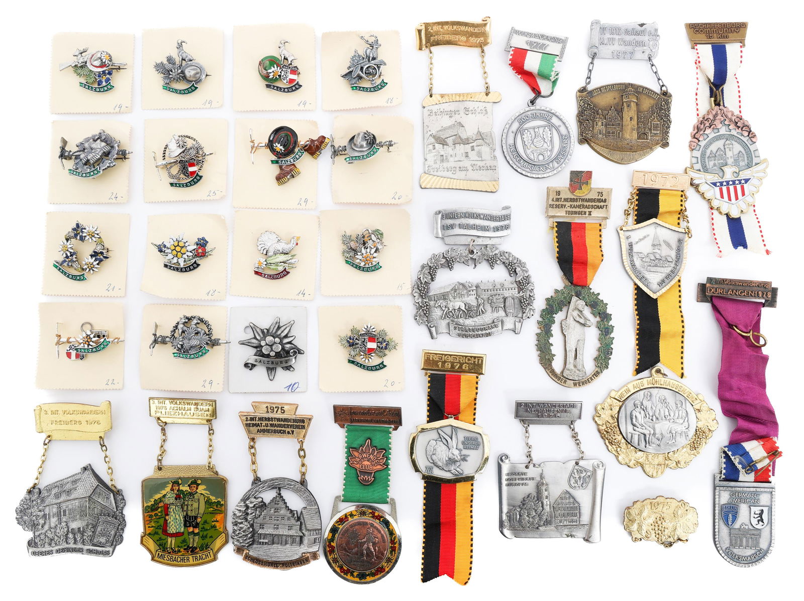 COLD WAR GERMAN VOLKSMARCH MEDALS & HAT PINS: COLD WAR GERMAN VOLKSMARCH MEDALS & HAT PINS Cold War German Volksmarch Medals & Hat Pins. (16) Medals from Tubingen, Neuhasen, Freigericht, Pliezhausen, Talheim volksmarches and more; (16) Souvenir p