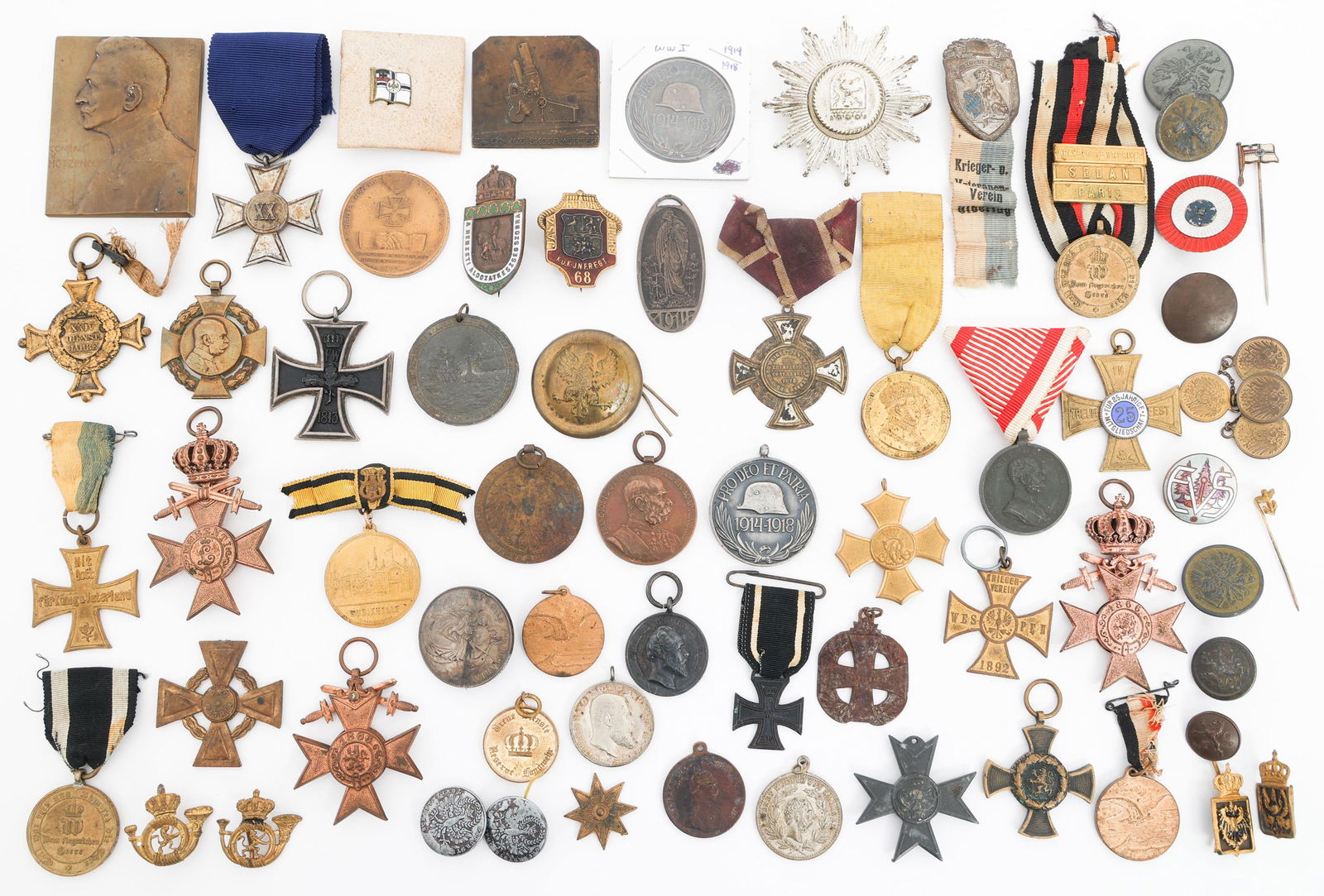 AUSTRO-HUNGARIAN & PRUSSIAN MEDALS & INSIGNIA: AUSTRO-HUNGARIAN & PRUSSIAN MEDALS & INSIGNIA 19th C. Austro-Hungarian & Prussian Medals & Insignia. Includes medals, tinnies, commemorative coins, small plaques and more. Size: 16" x 12" x 1.5"