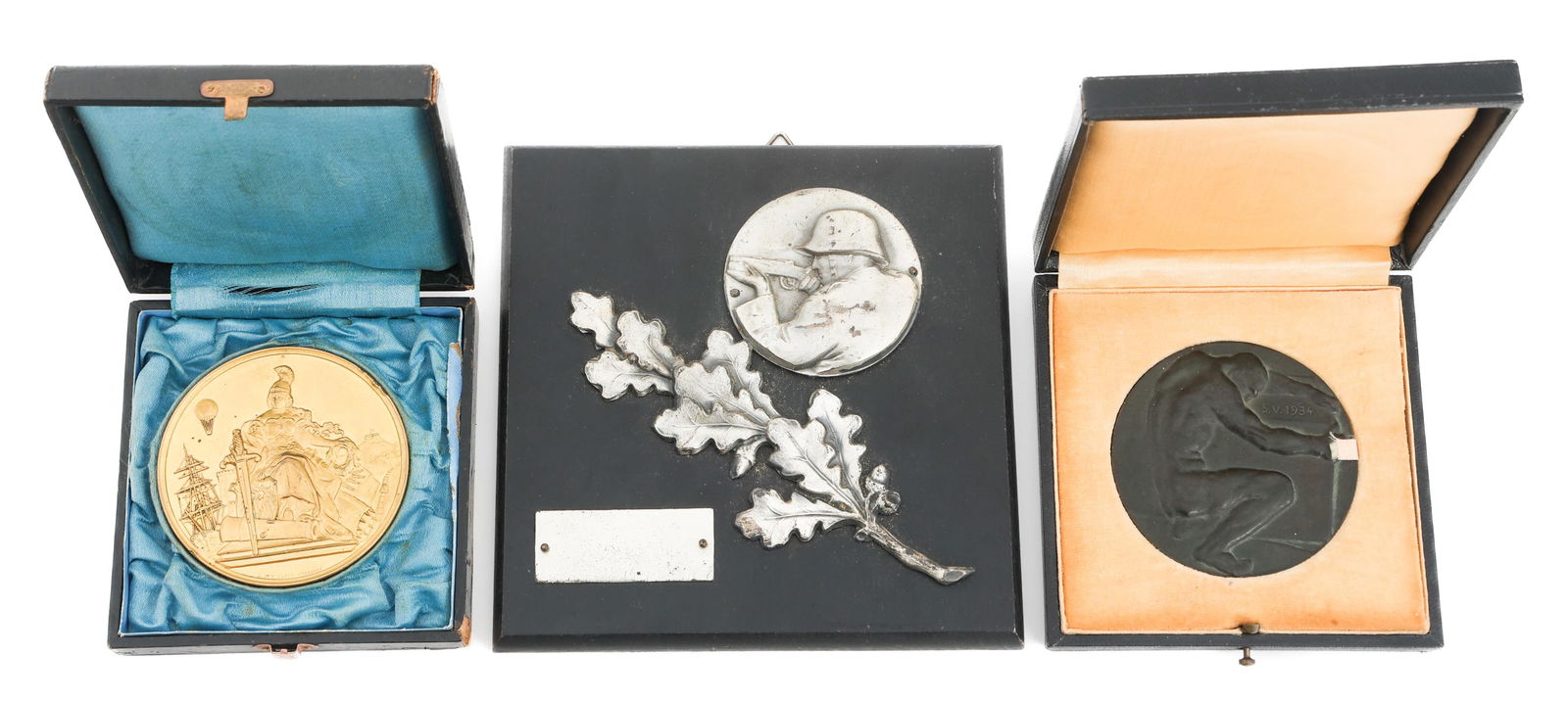 WWI - WWII GERMAN COMMEMORATIVE AWARDS: WWI - WWII GERMAN COMMEMORATIVE AWARDS WWI - WWII German Commemorative Medallions & Awards. (1) WWII German Army Marksmanship Competition Plaque. Wood & metal construction. Not named. (1) Bronze "Hind