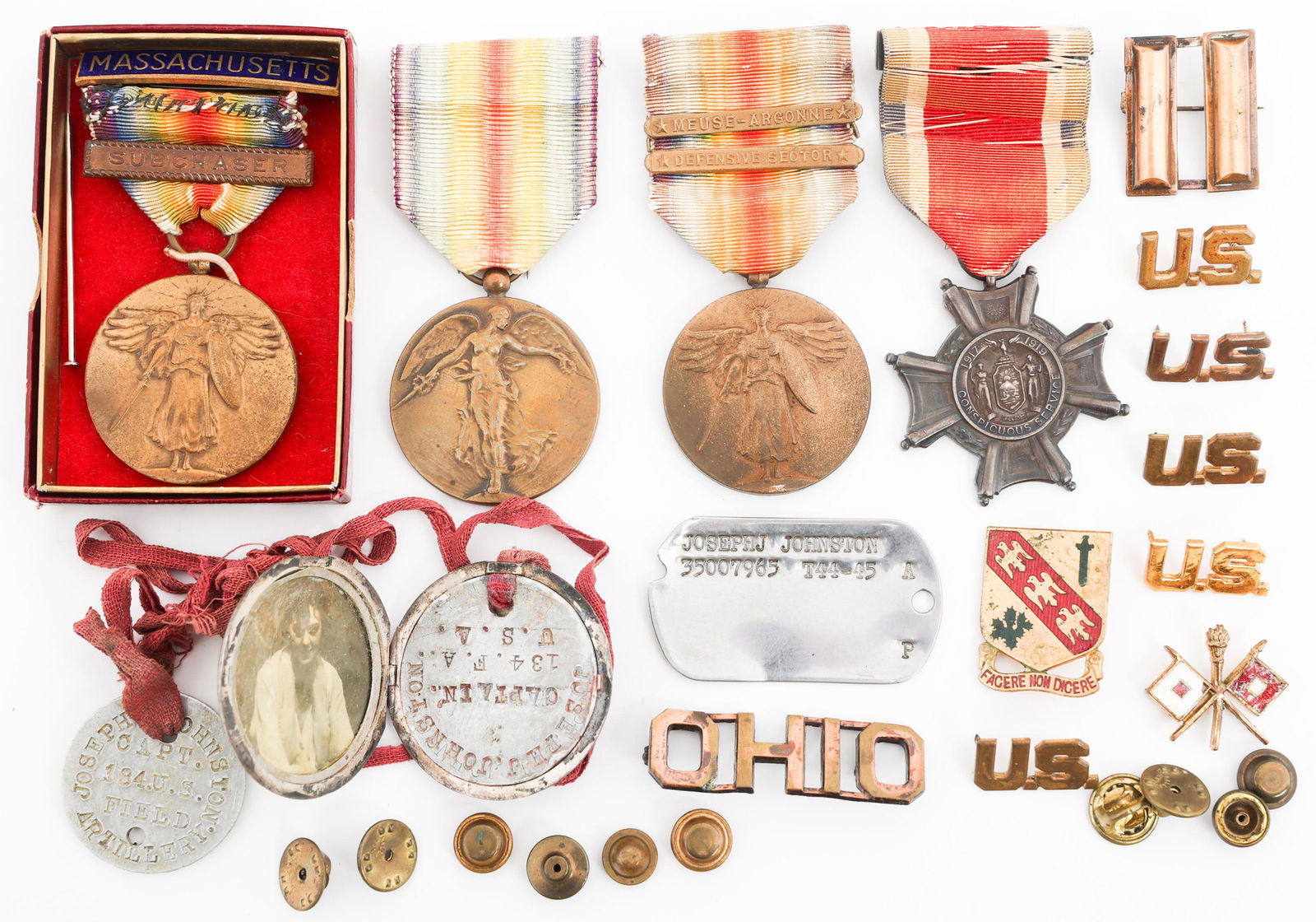 WWI - WWII NAMED MEDAL GROUPINGS: WWI - WWII NAMED MEDAL GROUPINGS WWI - WWII Named Medal Groupings. (1) 134th Field Artillery Captain Group. Named to Captain Joseph Jack Johnston. Includes Sweetheart locket with dog tags attached, ca