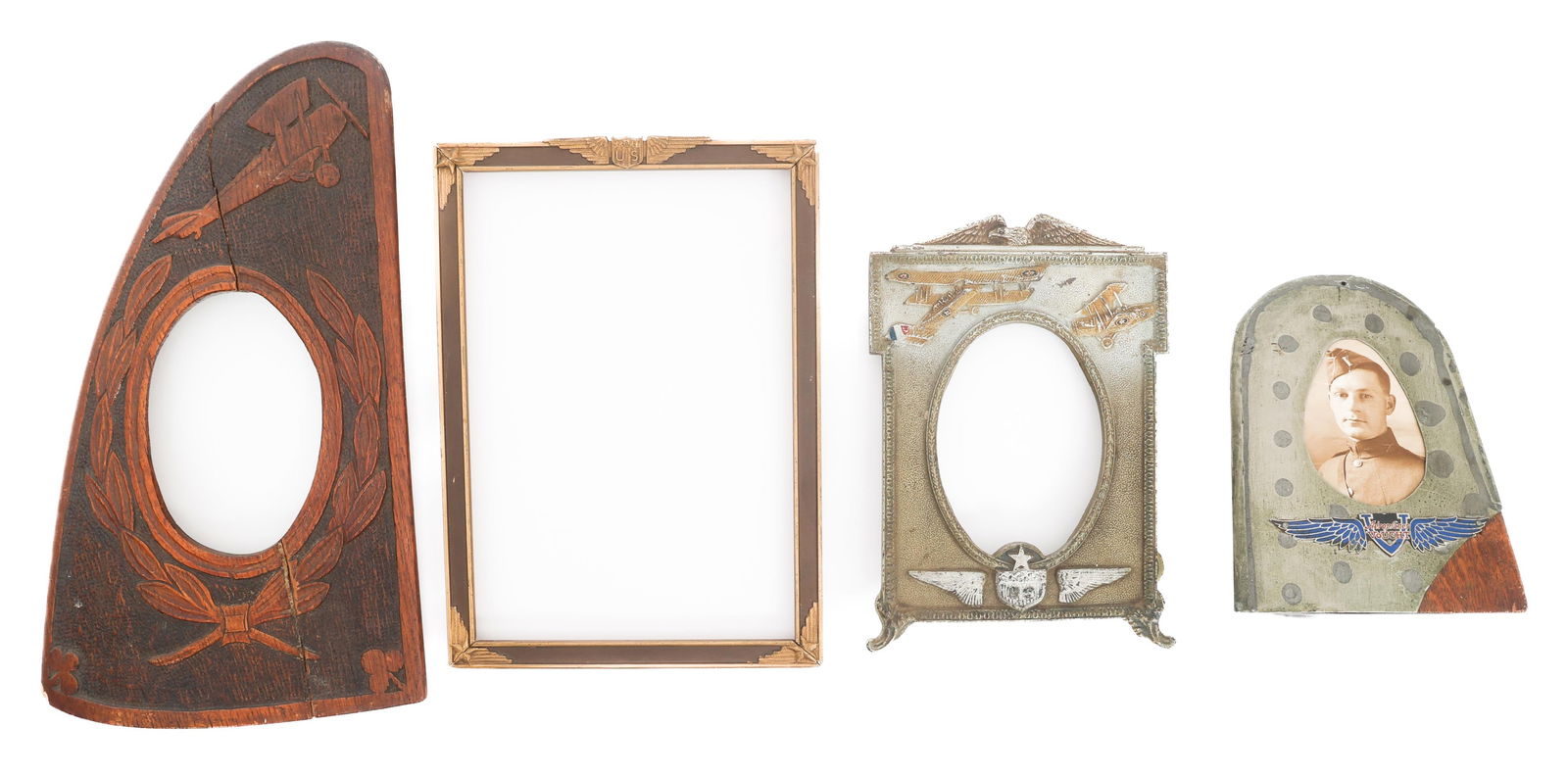 WWI US PROPELER TIP & AVIATION THEMED PHOTO FRAMES: WWI US PROPELER TIP & AVIATION THEMED PHOTO FRAMES WWI US Propeller Tip & Aviation Themed Photo Frames.(1) Picture frame made from wooden propeller tip. (1) Metal WWI Air Service picture frame. (1)