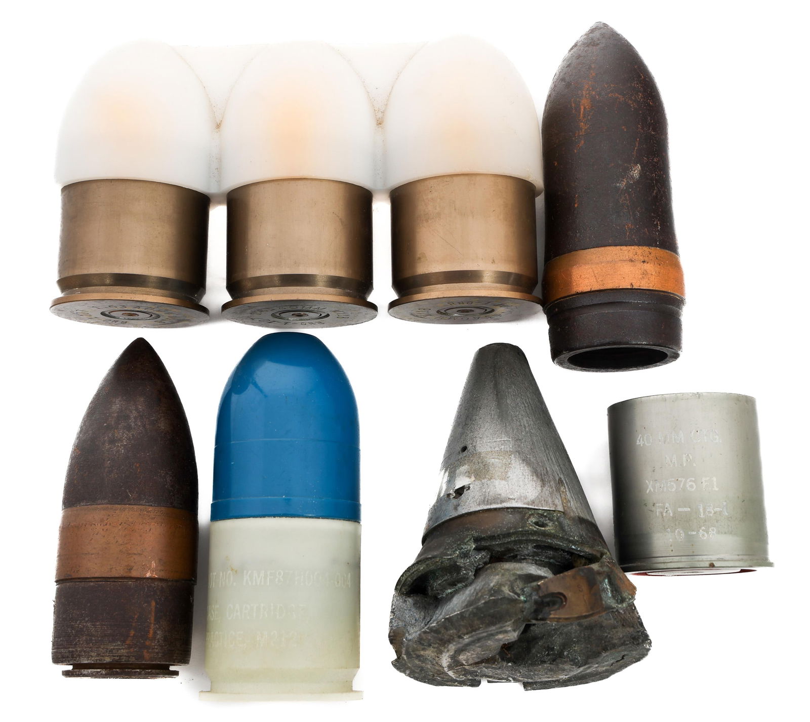 COLD WAR US ARMED FORCES 40MM ORDNANCE: COLD WAR US ARMED FORCES 40MM ORDNANCE Cold War US Armed Forces 40mm Ordnance. (1) Plastic 40mm Training Round. (4) 40mm Practice Cartridge Case. (1) Timing Fuse. (1) 40mm Projectile. (1) 37mm