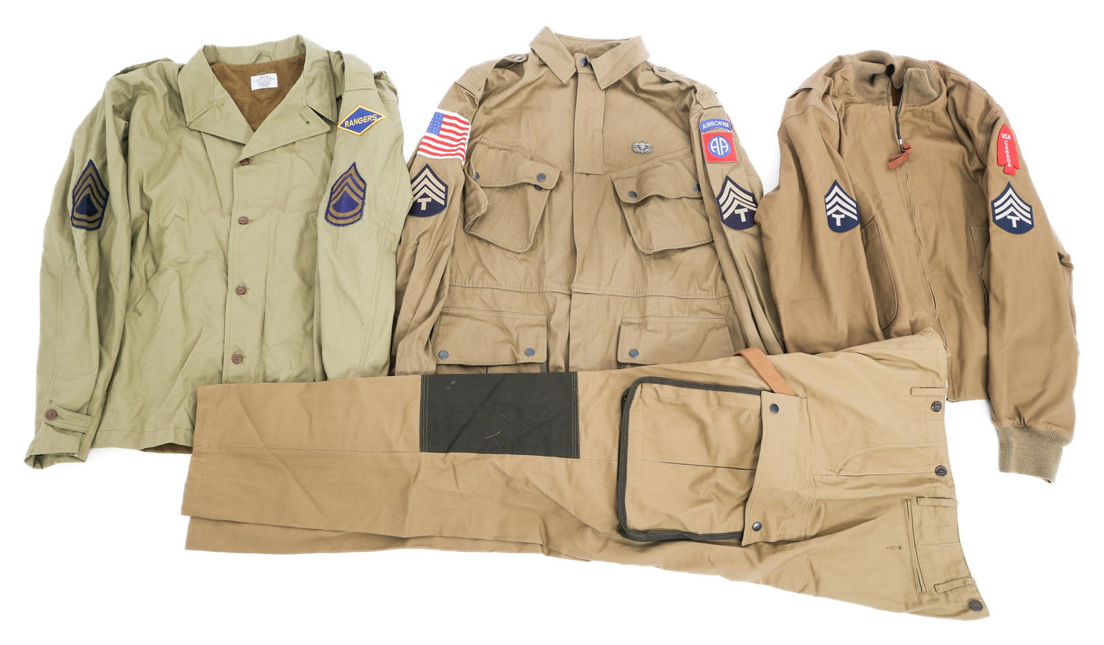 WWII RE-ENACTOR US RANGER & PARATROOPER UNIFORMS: WWII RE-ENACTOR US RANGER & PARATROOPER UNIFORMS Modern made WWII Re-enactor US Army Ranger & Paratrooper Uniforms. (1) M41 field jacket with Ranger patch. Size 48. (1) 82nd Airborne reinforced M41 ju