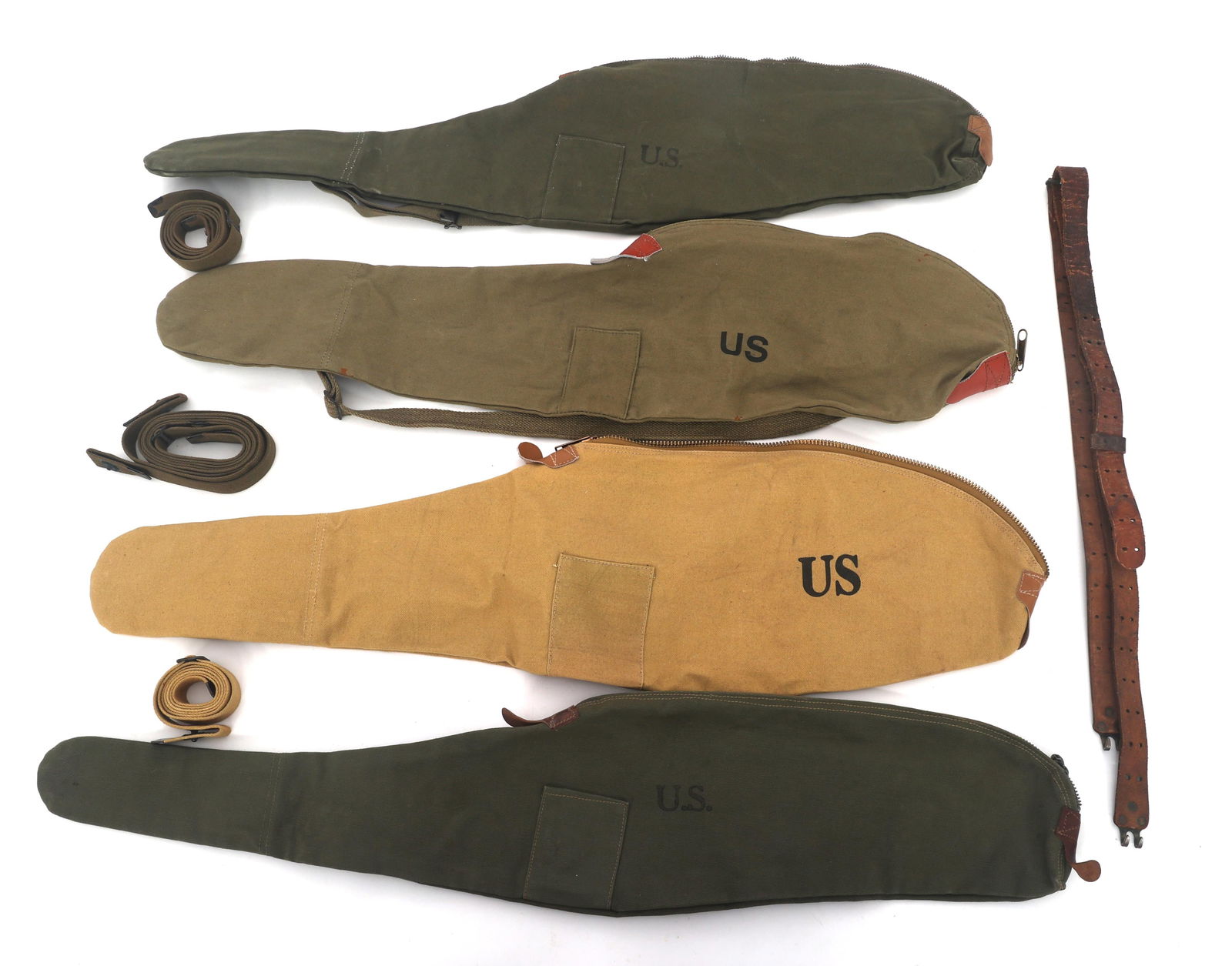 US M1 CARBINE CARRYING CASES AND SLINGS: US M1 CARBINE CARRYING CASES AND SLINGS Modern production US M1 carbine carry cases and slings. Four canvas M1 carbine carrying cases stamped US on front. Three canvas slings. One leather sling. Note: