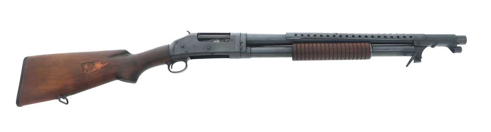 1943 WINCHESTER MODEL 1897 12 GAUGE TRENCH GUN: 1943 WINCHESTER MODEL 1897 12 GAUGE TRENCH GUN 1943 US Winchester Model 1897 12 gauge Trench Gun with Winchester letter. Left receiver stamped with U.S. and Flaming bomb. Barrel stamped with Flaming b