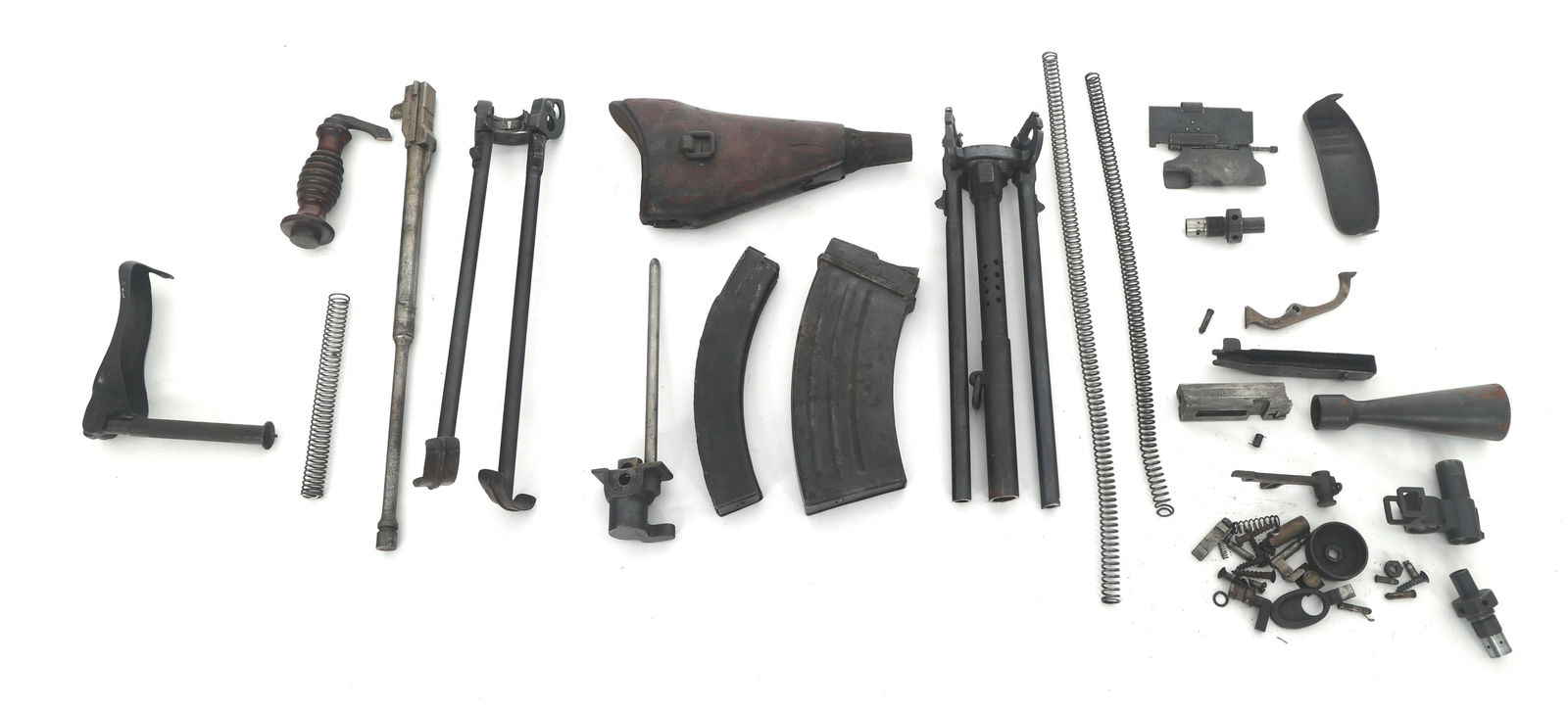 WWII JAPANESE NAMBU MACHINE GUN PARTS: WWII JAPANESE NAMBU MACHINE GUN PARTS WWII Japanese machine gun parts. Type 100 box magazine stamped 4 723. Type 99 bipods, magazine, bolt, buttstock with monopod, and small parts. Classification: Non