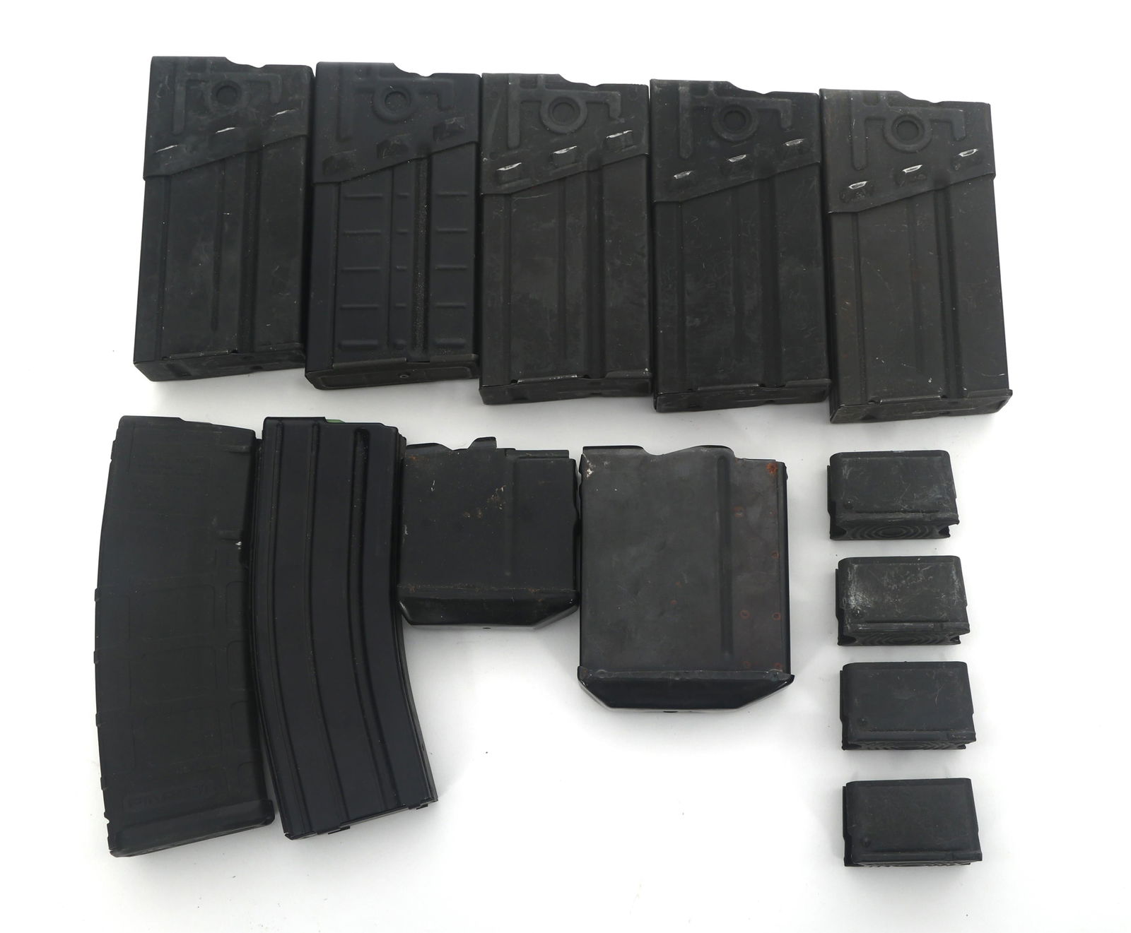 RIFLE MAGAZINES: RIFLE MAGAZINES Rifle magazine lot. 5 HK G3 7.62x51mm caliber magazines. Three marked HK G3, two unmarked. PMag 30 round 5.56 caliber magazine. C Productions LLC .223/5.56mm magazine. 2 unmarked Remin