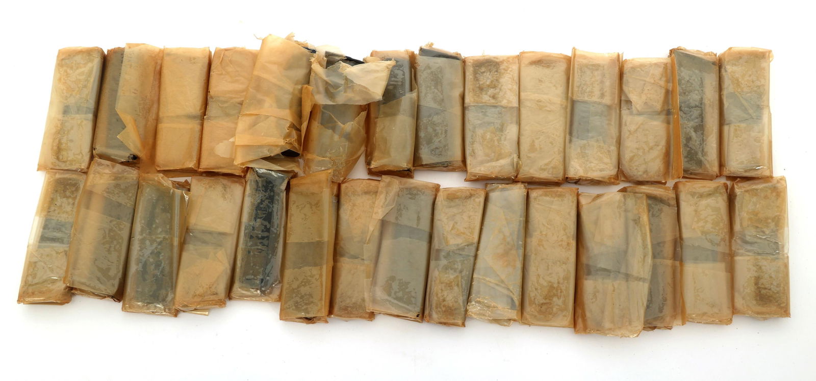 WALTHER P38 MAGAZINES - LOT OF 29: WALTHER P38 MAGAZINES - LOT OF 29 Lot of 29 Walther P 38 9x19mm caliber pistol magazines. Marked P38 9mm with Walther banner. Wrapped in wax paper. Size / Gauge: 9x19mm Note: Shipping & Payment 