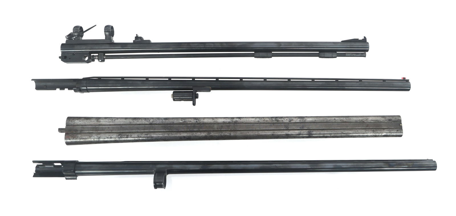 SHOTGUN AND PERCUSSION RIFLE BARRELS: SHOTGUN AND PERCUSSION RIFLE BARRELS Shotgun and percussion rifle barrels. A) Ithaca Model 52 Featherlight 12 gauge 32" shotgun barrel. 2.75" shells. Fixed Improved Modified choke, Blued finish. Vente