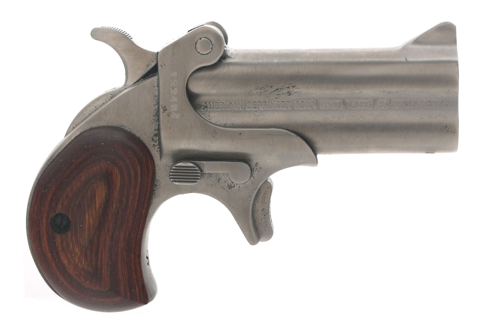 AMERICAN DERRINGER CORP MODEL M-1 DERRINGER: AMERICAN DERRINGER CORP MODEL M-1 DERRINGER American Derringer Corp Model M-1 .45 Colt / .410 gauge caliber Derringer. Stainless steel finish. Fixed sights. Wood grips. Caliber / Gauge 45 LC / 410 Bar
