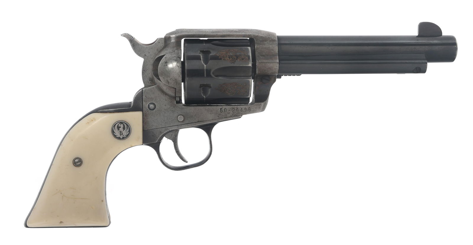 RUGER MODEL VAQUERO .45 CALIBER SA REVOLVER: RUGER MODEL VAQUERO .45 CALIBER SA REVOLVER 1997 Ruger Model Vaquero .45 Colt caliber single action revolver. Engraved cylinder. Blued finish. Fixed sights. Composite grips with Ruger medallion. Six s