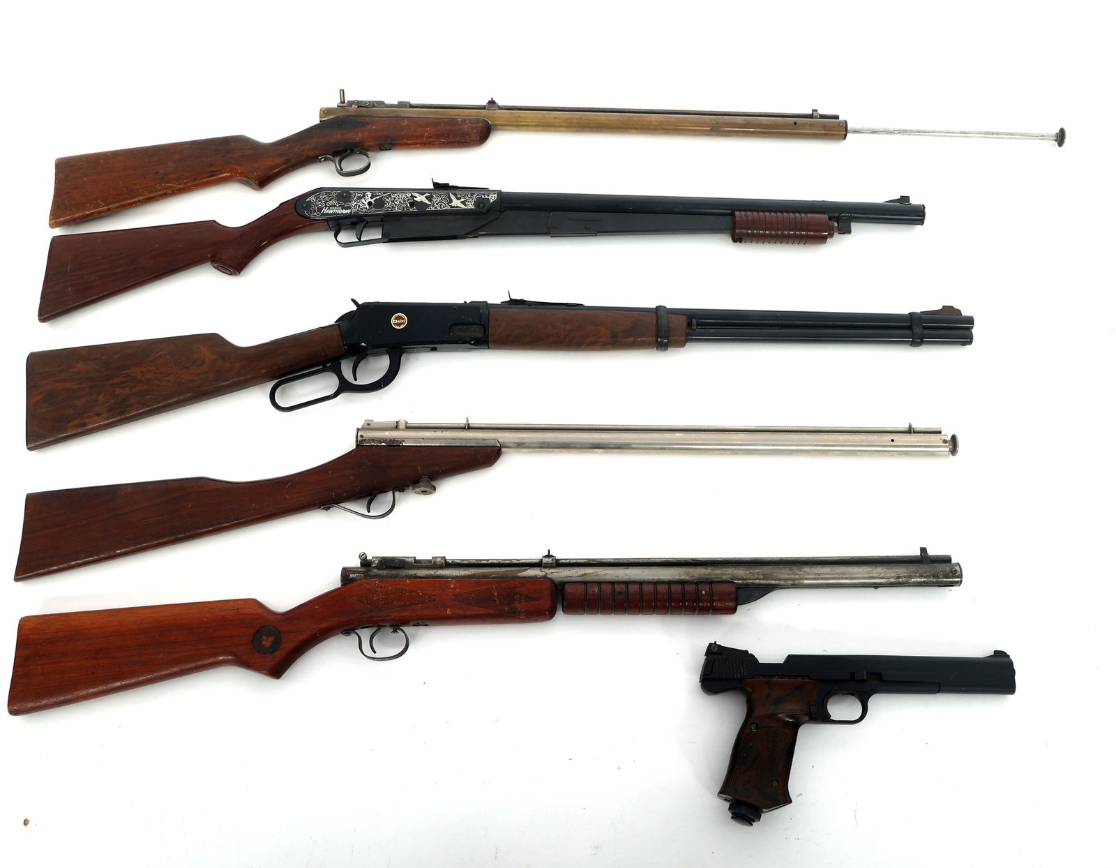 DAISY, BEN FRANKLIN, AND S&W AIR GUNS: DAISY, BEN FRANKLIN, AND S&W AIR GUNS Daisy & Benjamin Franklin Air Rifles and Smith & Wesson .22 caliber CO2 Pistol. A) Wards Model Hawthorne Model 25 pump action BB rifle. B) Benjamin Franklin