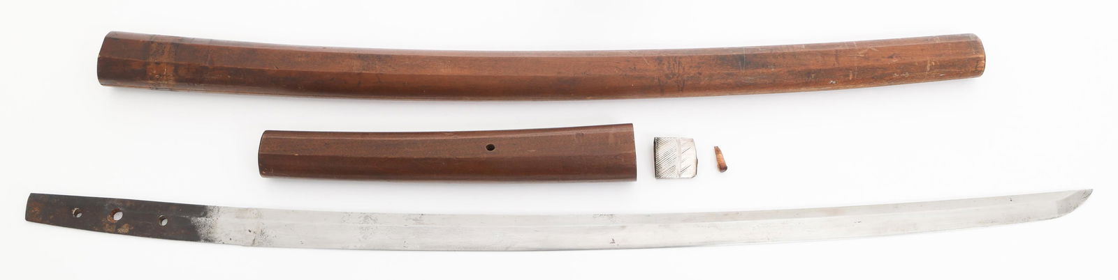 JAPANESE SIGNED 3 HOLE TANG KATANA & WOODEN SAYA: JAPANESE SIGNED 3 HOLE TANG KATANA & WOODEN SAYA Japanese Signed Katana. Single edged, bright blade. No visible Hamon. Silver Habaki with wooden Tsuka. Kanji signed, three-hole tang. Wooden Saya. Blad