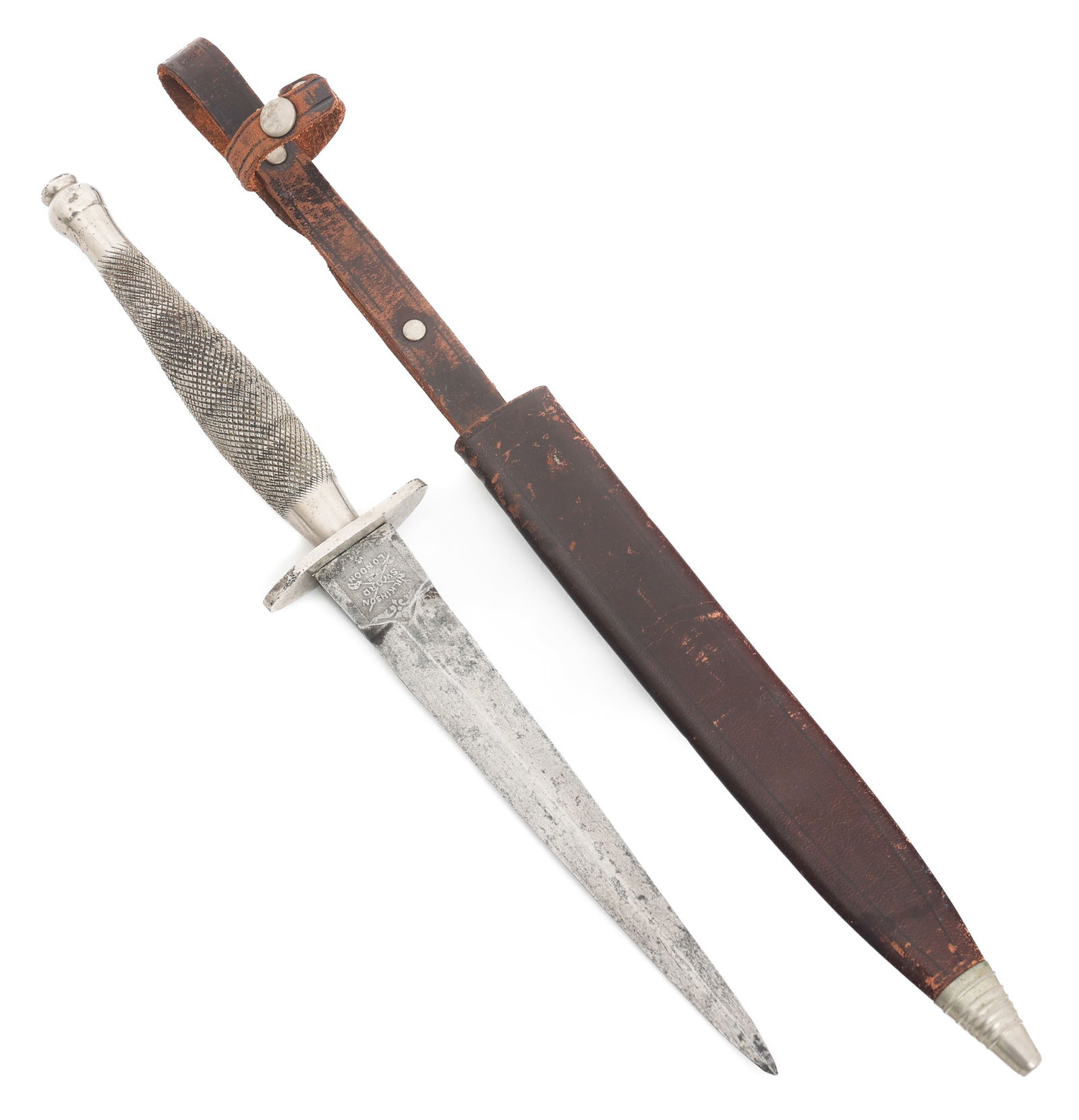 FIRST PATTERN FAIRBAIRN SYKES KNIFE by WILKINSON: FIRST PATTERN FAIRBAIRN SYKES KNIFE by WILKINSON WWII First Pattern Fairbairn Sykes Fighting Knife. Double edged stiletto blade. Maker mark of Wilkinson Sword Co. etched on the ricasso. 2" S shaped cr