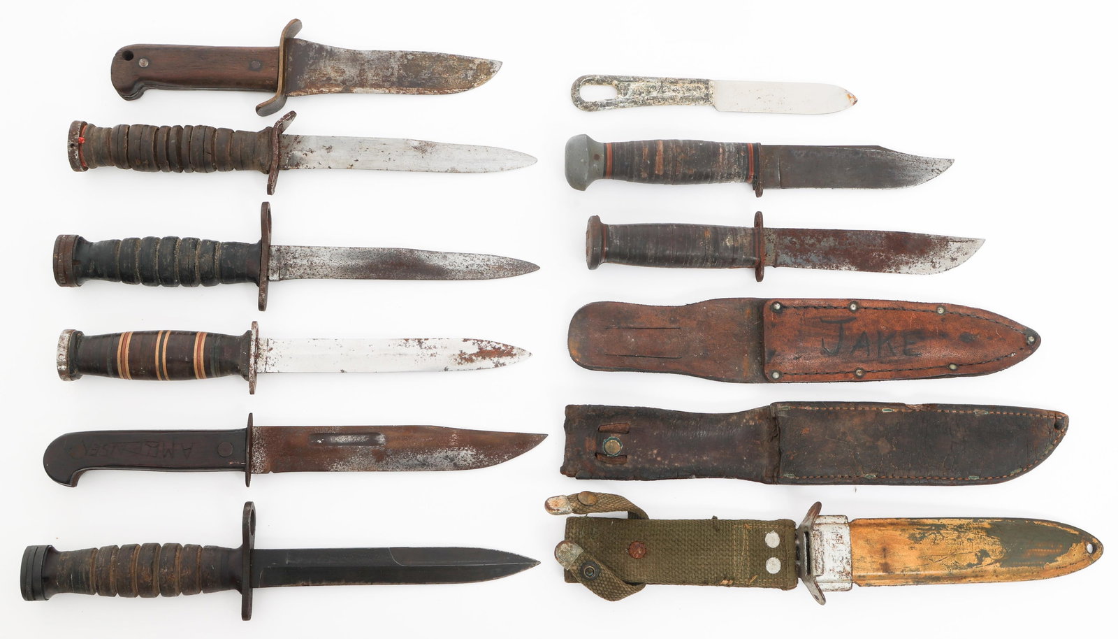 WWII - COLD WAR US ARMED FORCES & CIVILIAN KNIVES: WWII - COLD WAR US ARMED FORCES & CIVILIAN KNIVES WWII - Cold War US Armed Forces & Civilian Knives and Bayonets. (1) M3 Fighting Knife. Marked US M3 ACC under the guard. Stacked leather handle. No sc