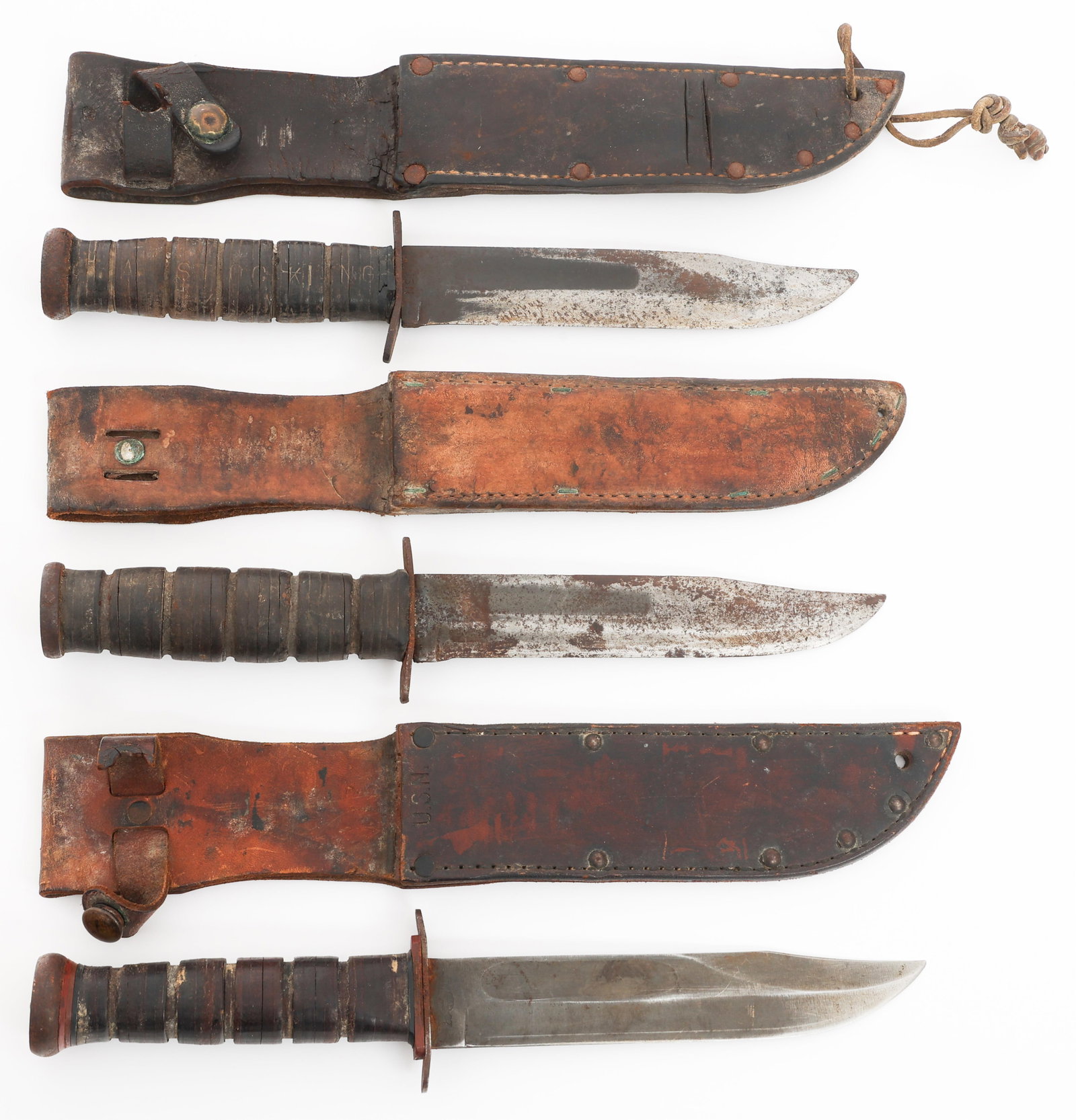 WWII USMC & NAVY MKII FIGHTING KNIVES WITH SHEATHS: WWII USMC & NAVY MKII FIGHTING KNIVES WITH SHEATHS WWII USMC and Navy MkII Fighting Knives. (1) Pal RH 37 USN MkII. Single edged blade with fuller. Maker marked by Pal RH 37 on the ricasso, marked US