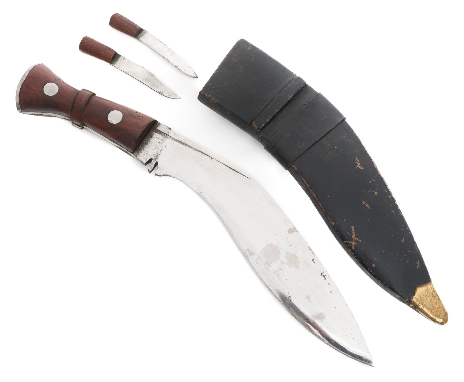 INDIAN MADE KUKRI KNIFE WITH SCABBARD: INDIAN MADE KUKRI KNIFE WITH SCABBARD Indian Made Kukri Knife. Single edged, curved blade with fuller. India stamped on the ricasso. Full tang construction with wooden grips. Leather wrapped wood scab