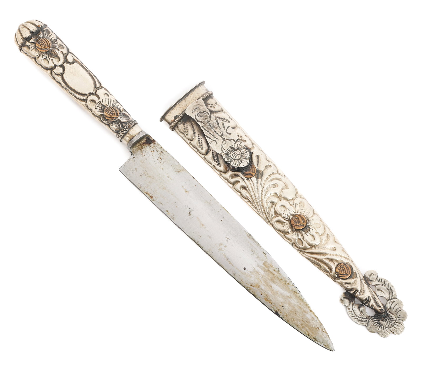 ARGENTINIAN GAUCHO KNIFE by INDUSTRIA TANDIL: ARGENTINIAN GAUCHO KNIFE by INDUSTRIA TANDIL Argentinian Gaucho Knife. Single edged, bright blade. Maker marked by Industria Tandil. Decorated alloy handle and scabbard. Blade Length: 7" Total
