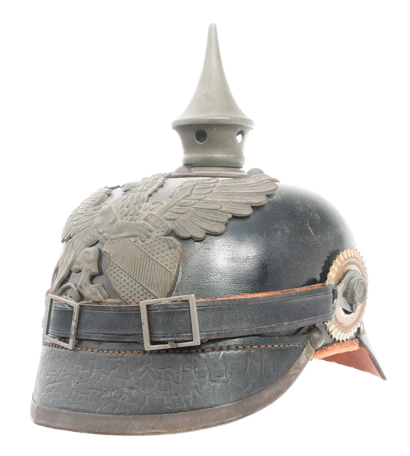 WWI IMPERIAL GERMAN BADEN M1915 PICKELHAUBE: WWI IMPERIAL GERMAN BADEN M1915 PICKELHAUBE WWI Imperial German Baden M1915 Pickelhaube. Black leather hard shell with steel visor trim, rear spine and removable spike. Steel Baden front plate. Double